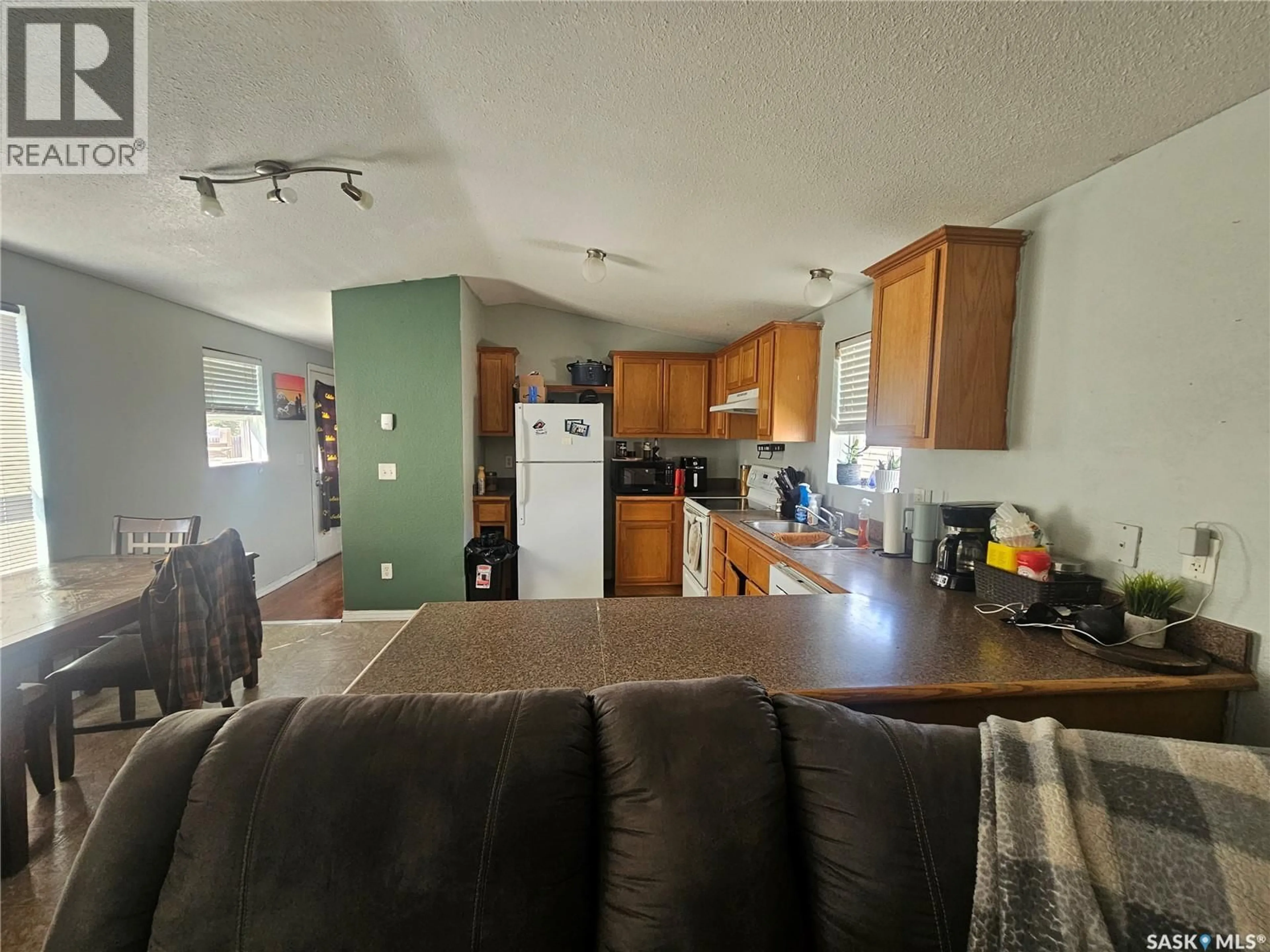 Open concept kitchen, unknown for 159 PRAIRIE SUN COURT, Swift Current Saskatchewan S9H3X6