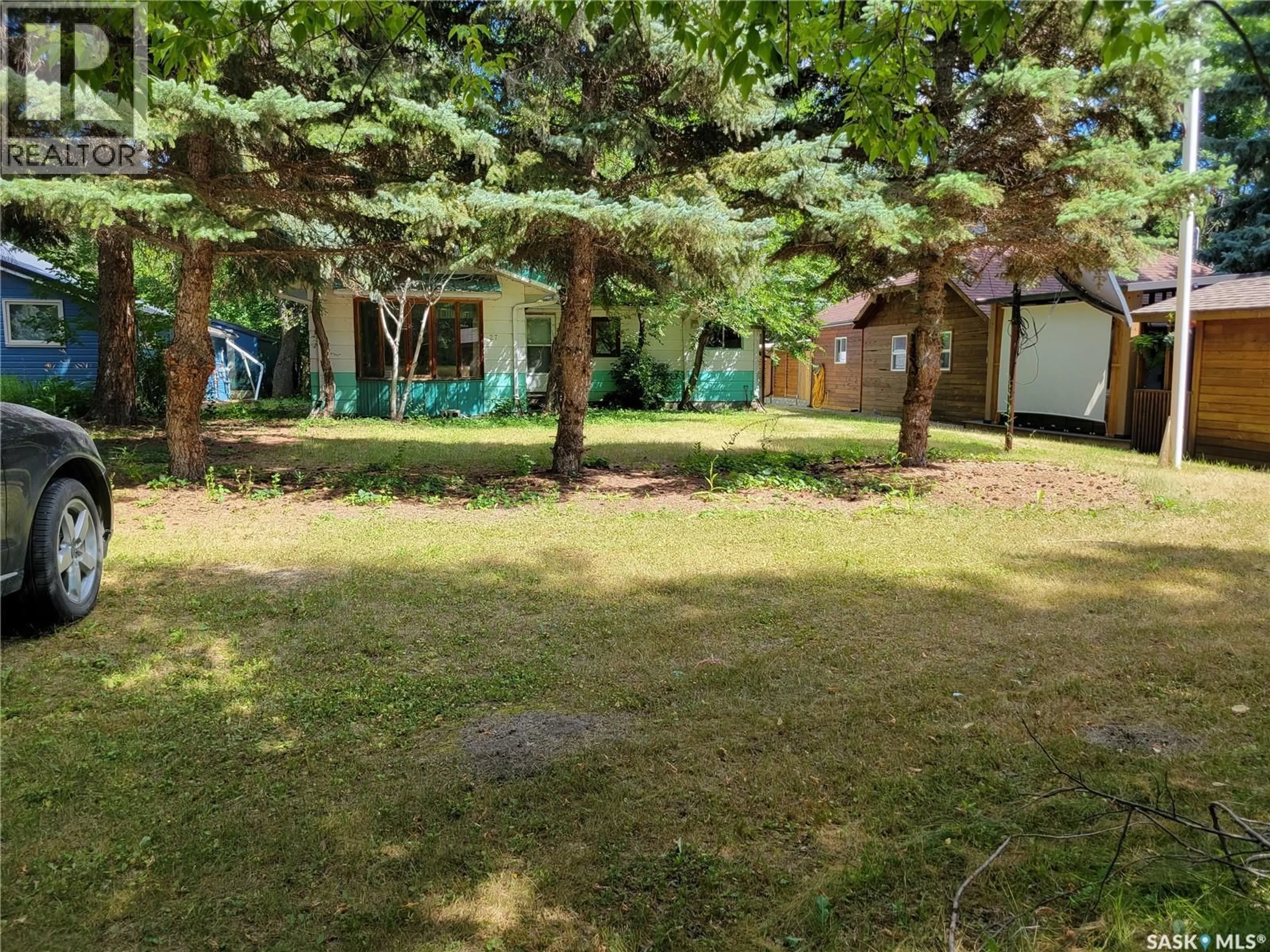 A pic from outside/outdoor area/front of a property/back of a property/a pic from drone, forest/trees view for 27 ELM STREET, Katepwa Beach Saskatchewan S0G2Y0