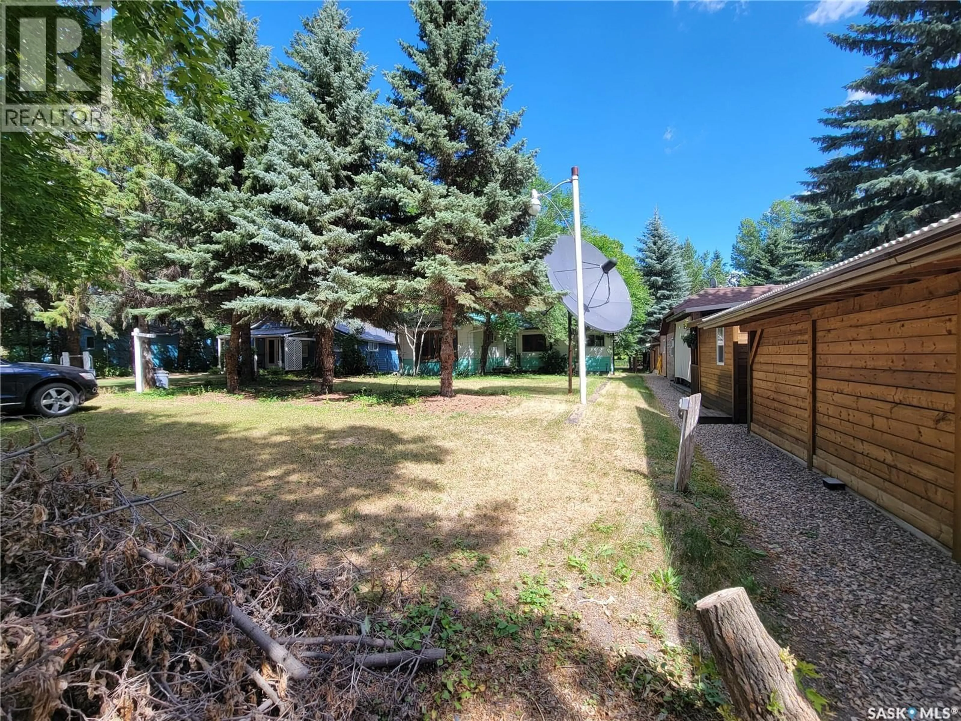 A pic from outside/outdoor area/front of a property/back of a property/a pic from drone, unknown for 27 ELM STREET, Katepwa Beach Saskatchewan S0G2Y0