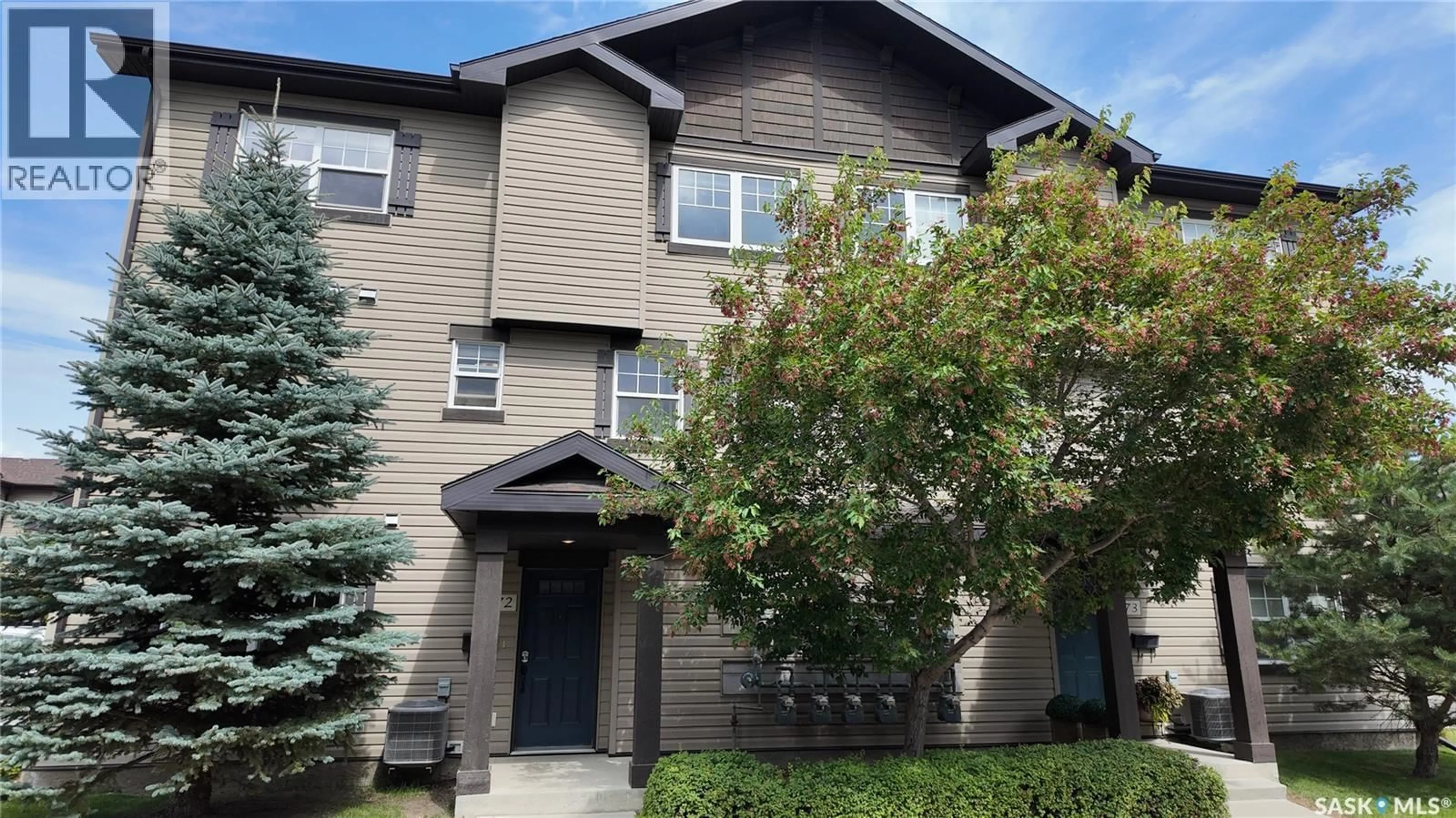 Home with vinyl exterior material, street for 572 150 LANGLOIS WAY, Saskatoon Saskatchewan S7T0L3