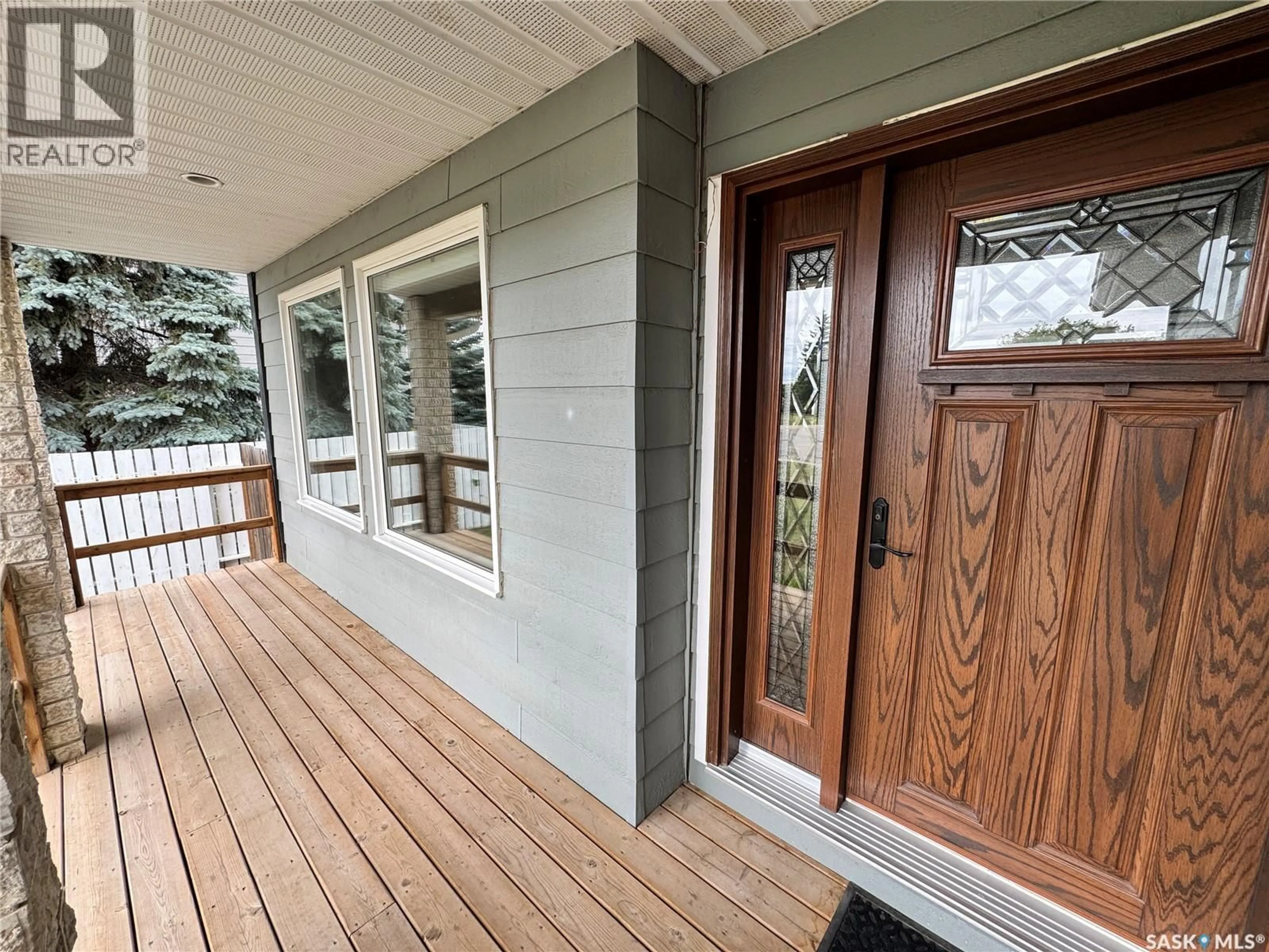 Home with vinyl exterior material, street for 113 7TH AVENUE, Biggar Saskatchewan S0K0M0