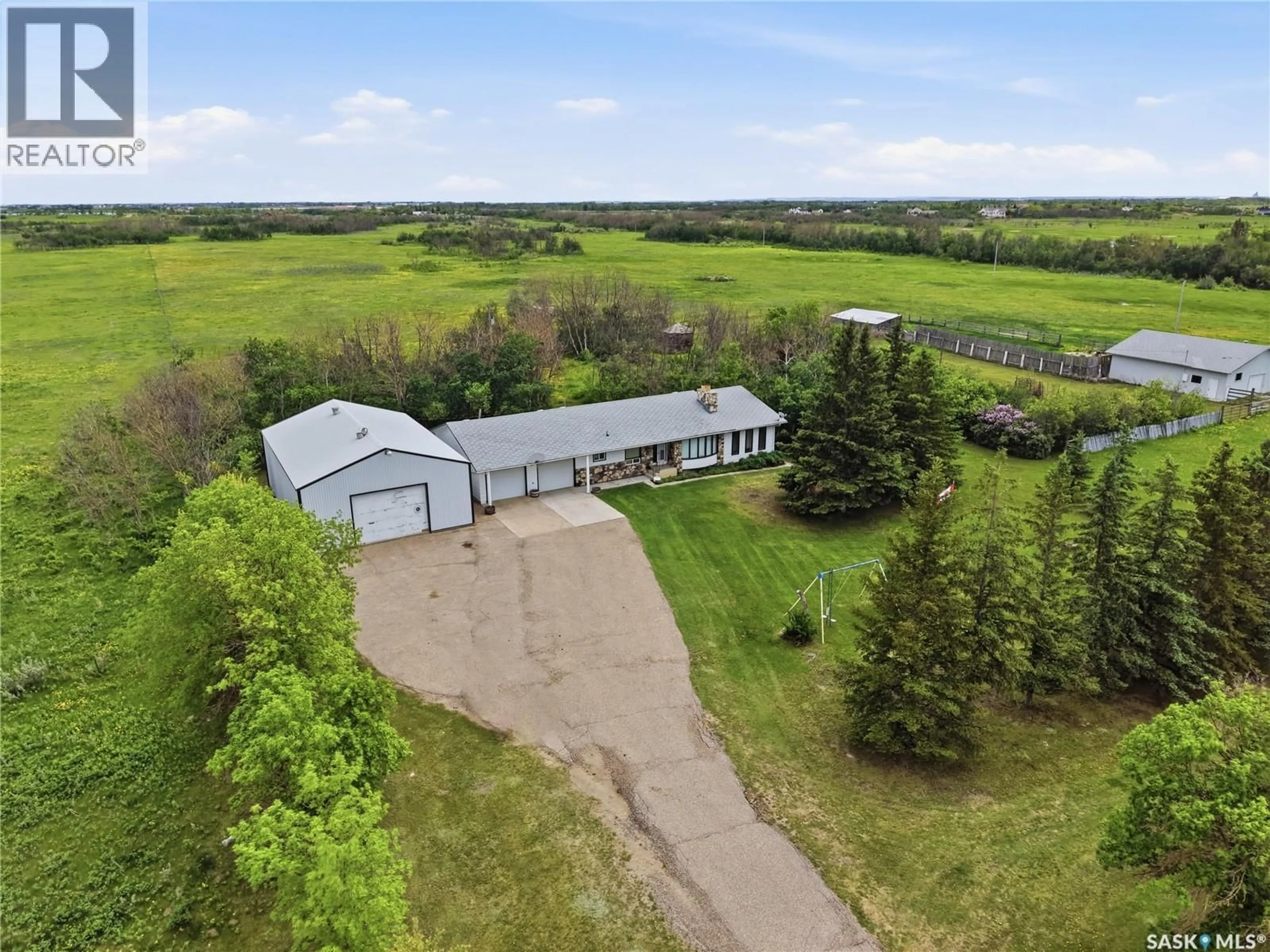 A pic from outside/outdoor area/front of a property/back of a property/a pic from drone, building for FRIESEN ACREAGE, Corman Park Rm No. 344 Saskatchewan S0K2T0