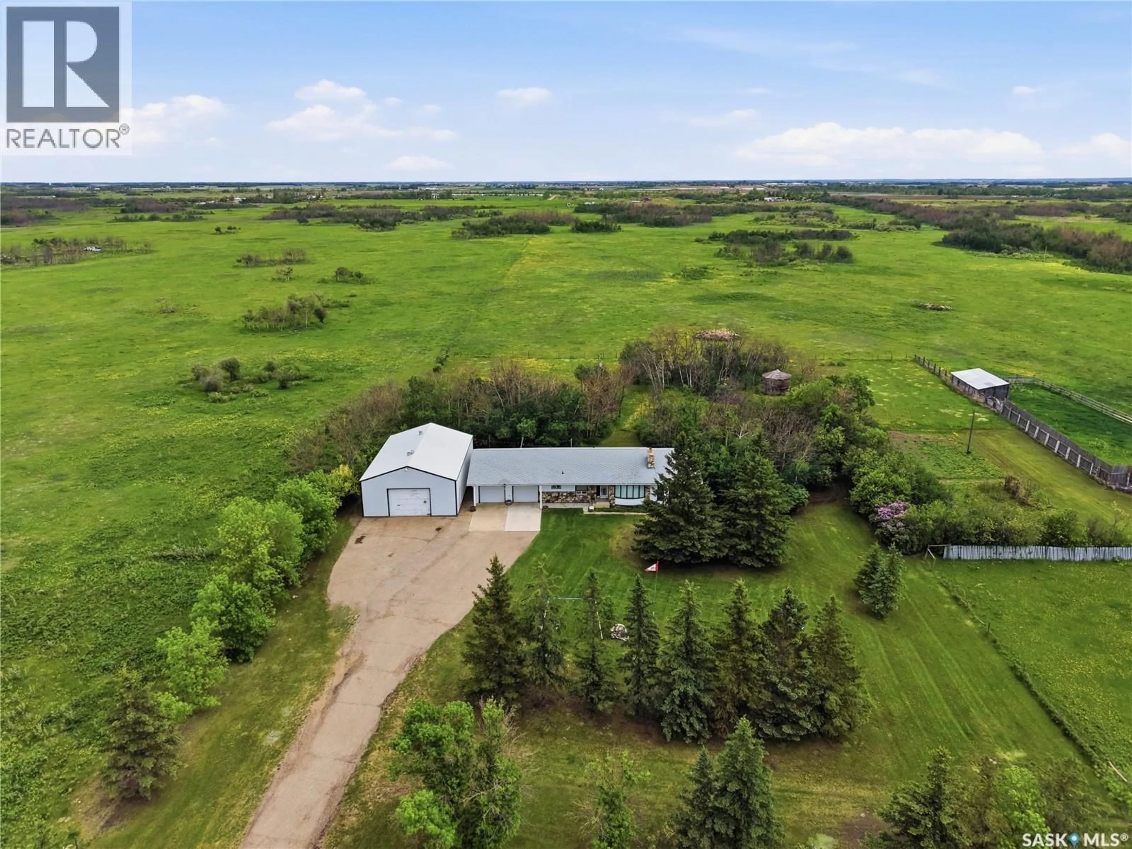 A pic from outside/outdoor area/front of a property/back of a property/a pic from drone, building for FRIESEN ACREAGE, Corman Park Rm No. 344 Saskatchewan S0K2T0