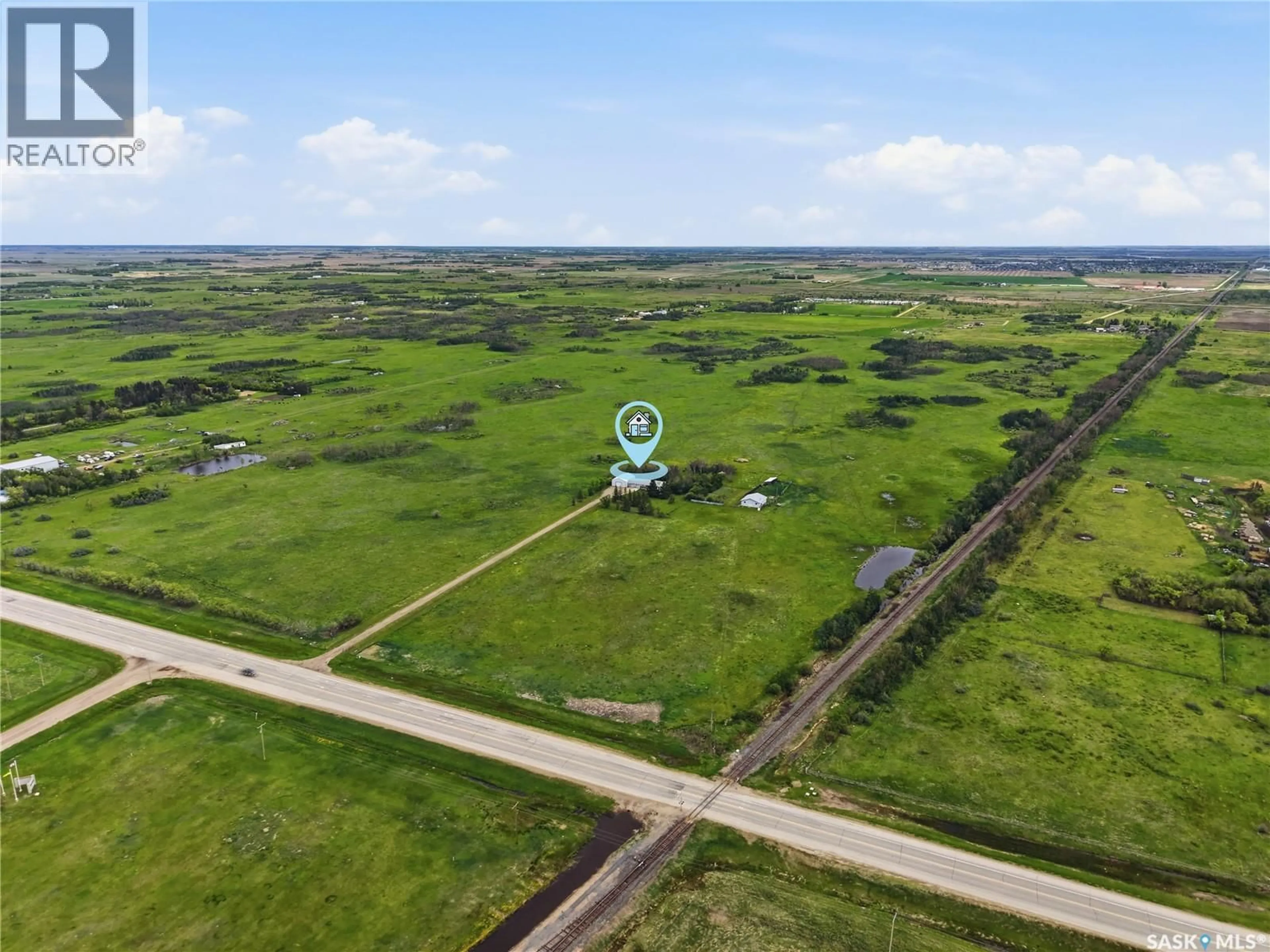 A pic from outside/outdoor area/front of a property/back of a property/a pic from drone, unknown for FRIESEN ACREAGE, Corman Park Rm No. 344 Saskatchewan S0K2T0