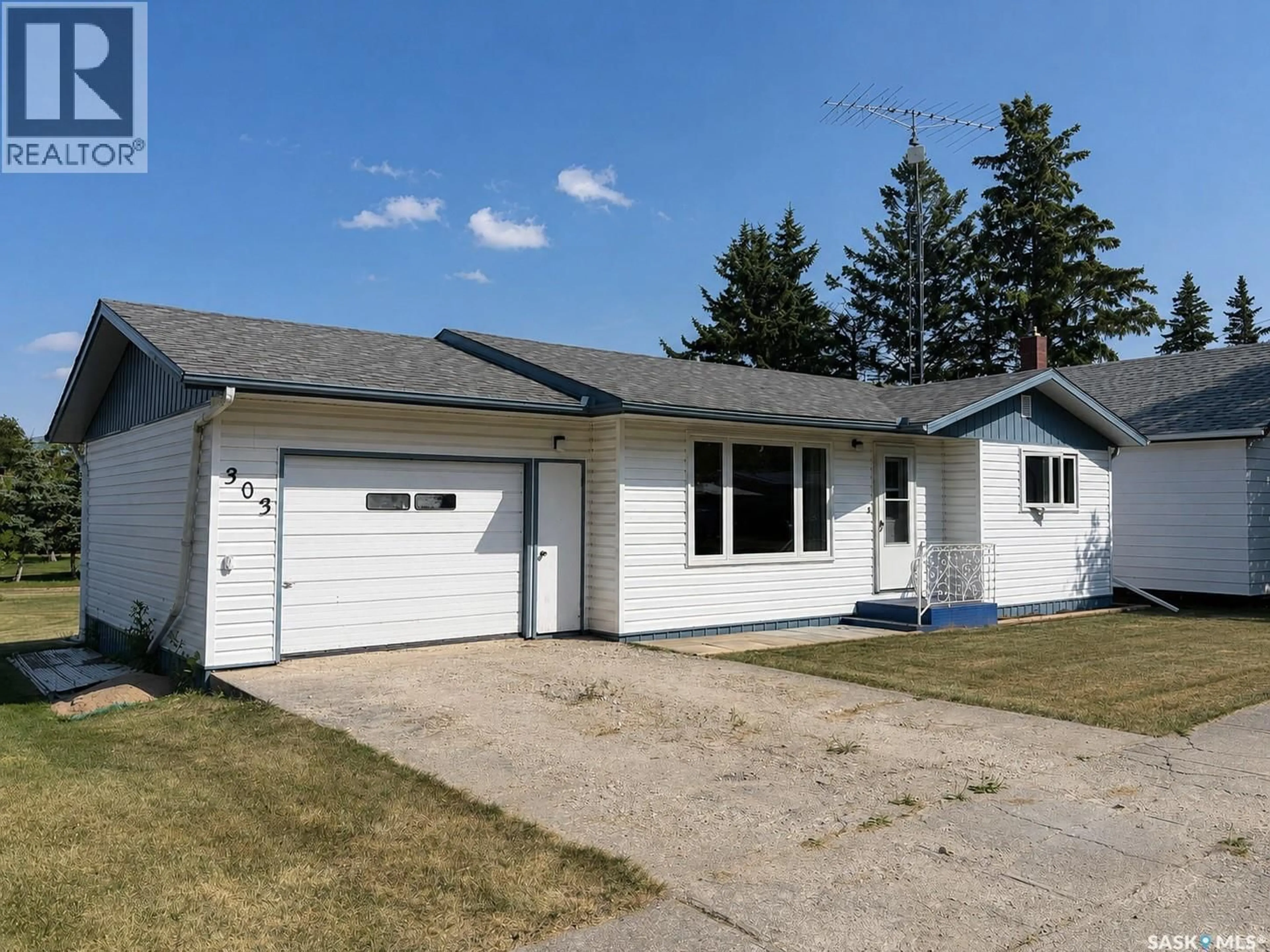 Home with vinyl exterior material, street for 303 LOUIS STREET, Neudorf Saskatchewan S0A2T0