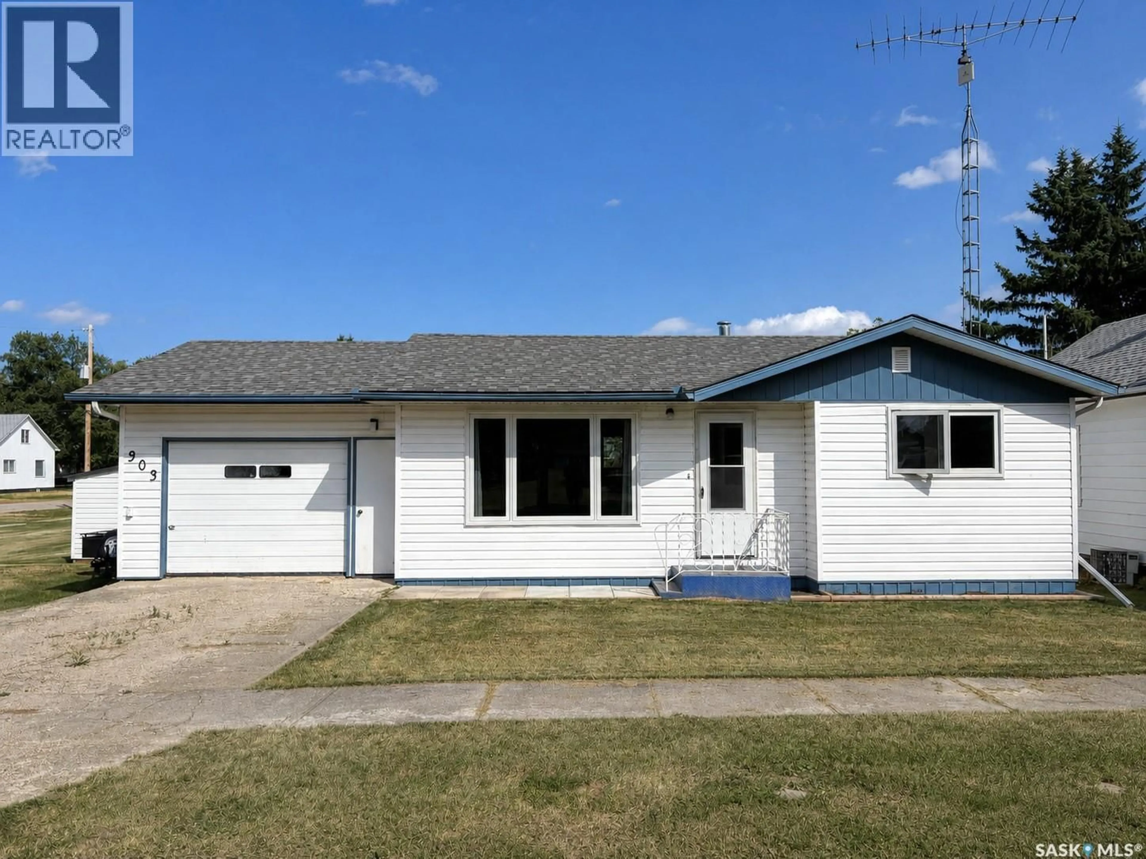 Home with vinyl exterior material, street for 303 LOUIS STREET, Neudorf Saskatchewan S0A2T0