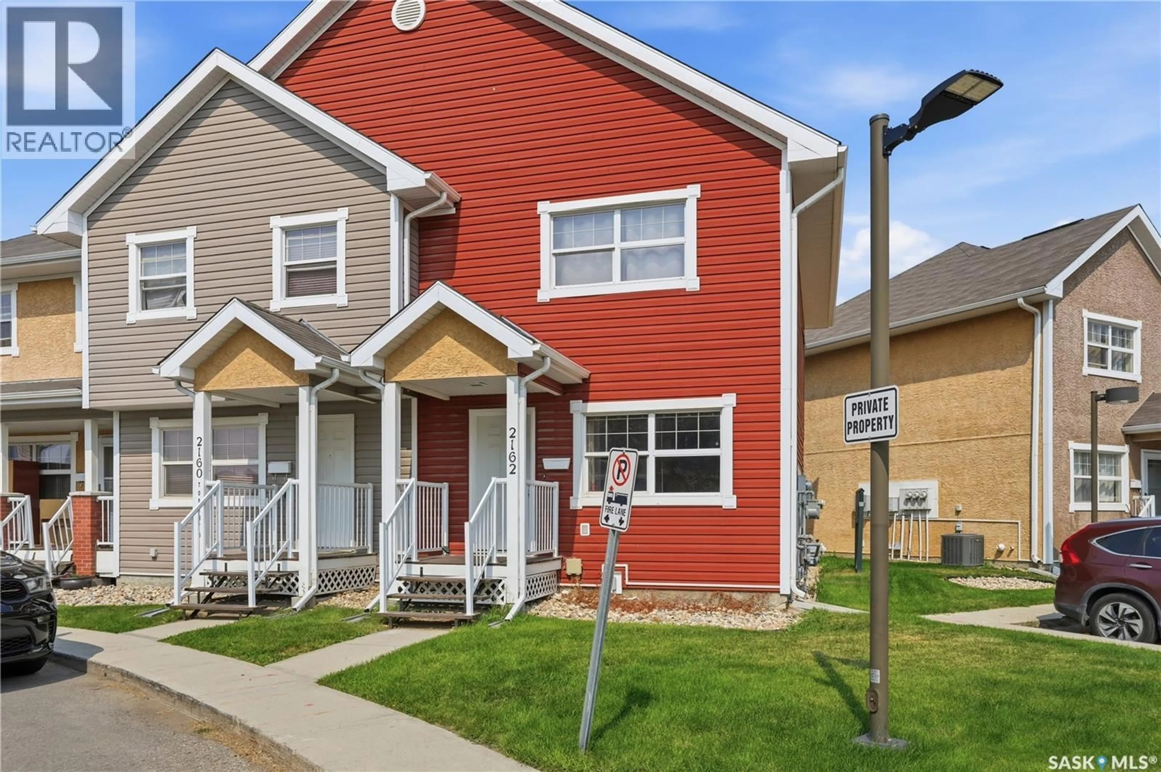 Home with vinyl exterior material, street for 2162 TORONTO STREET, Regina Saskatchewan S4P0B8