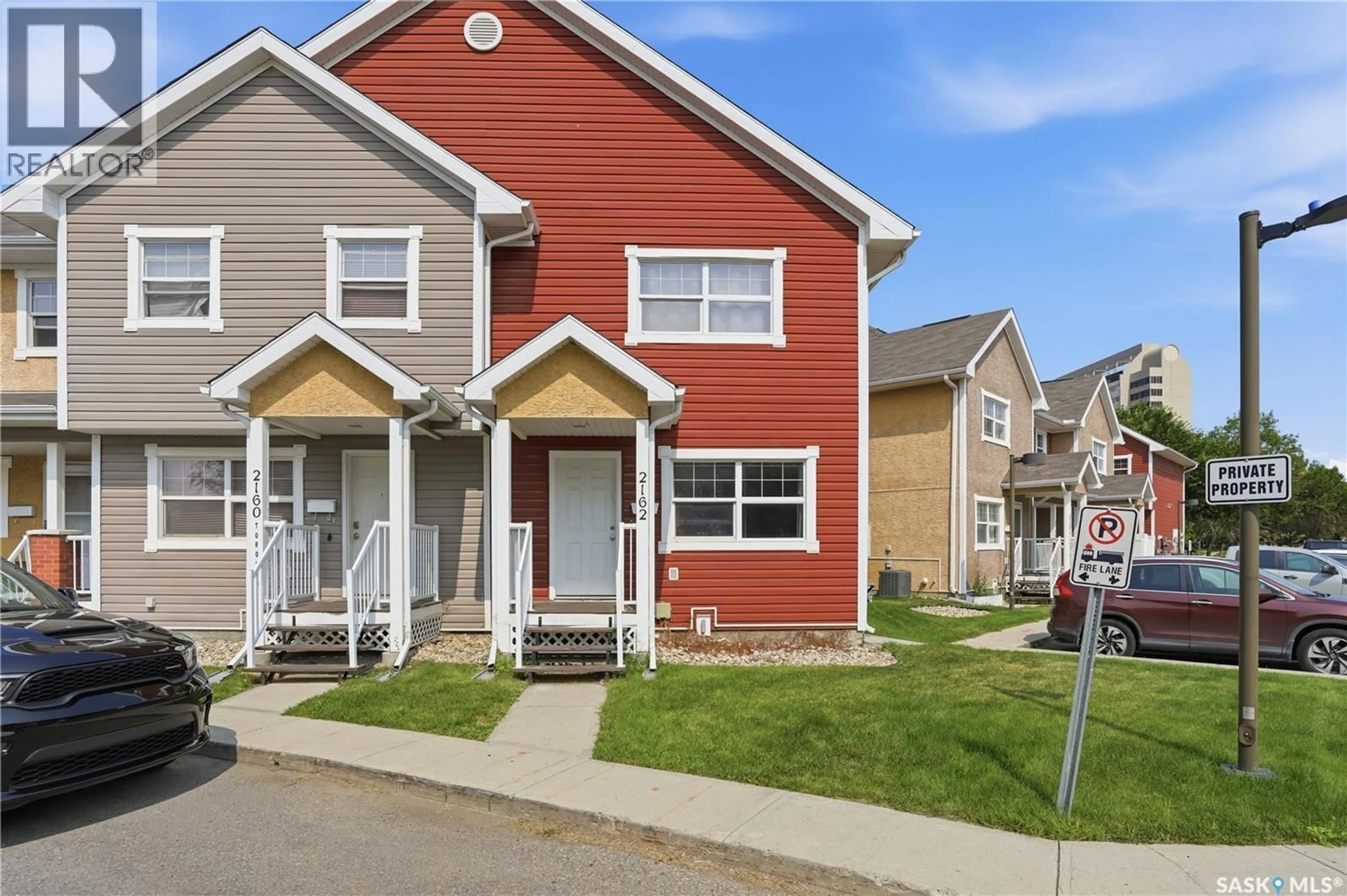 Home with vinyl exterior material, street for 2162 TORONTO STREET, Regina Saskatchewan S4P0B8