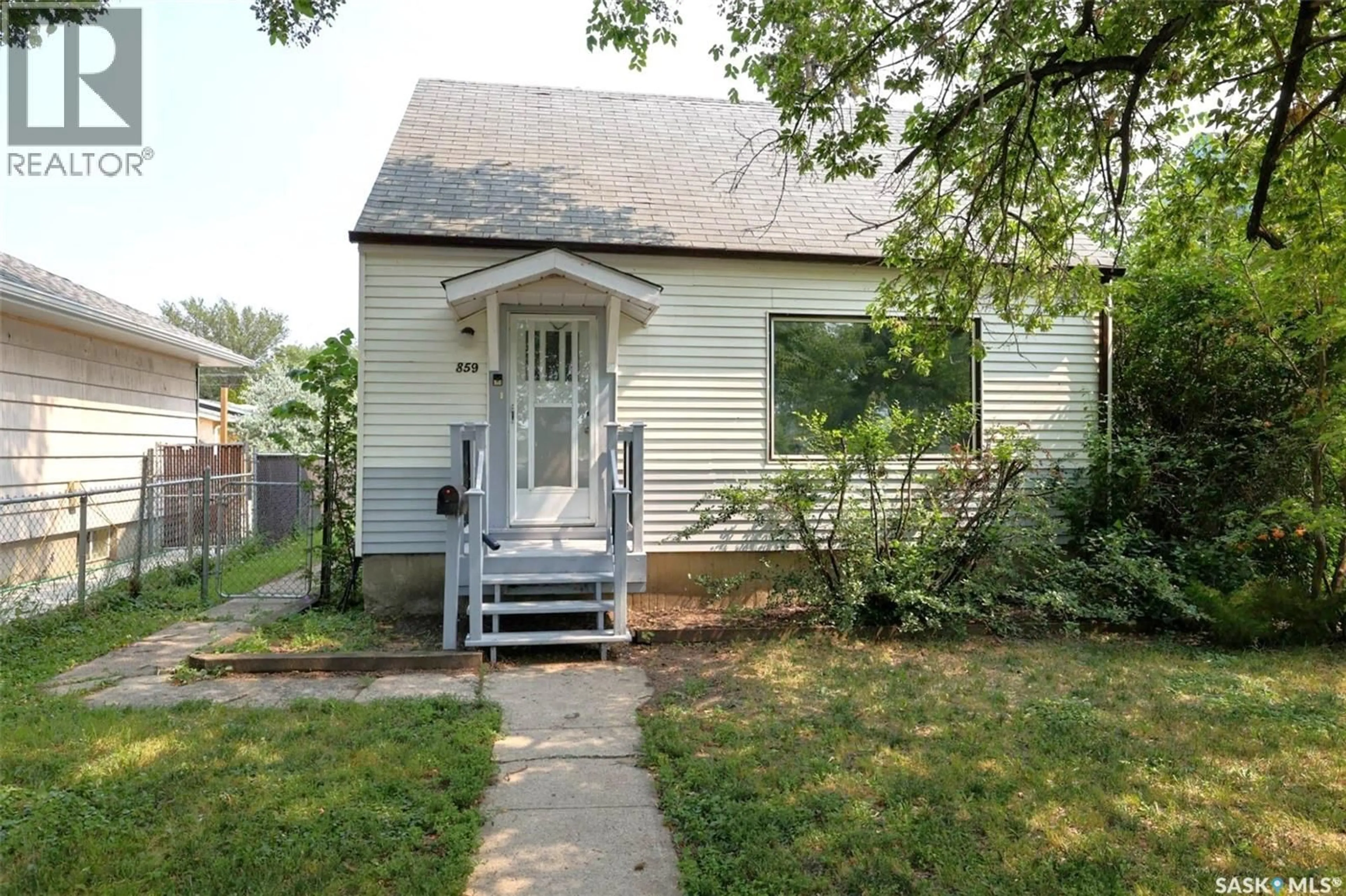 Home with vinyl exterior material, street for 859 PASQUA STREET, Regina Saskatchewan S4T4K7