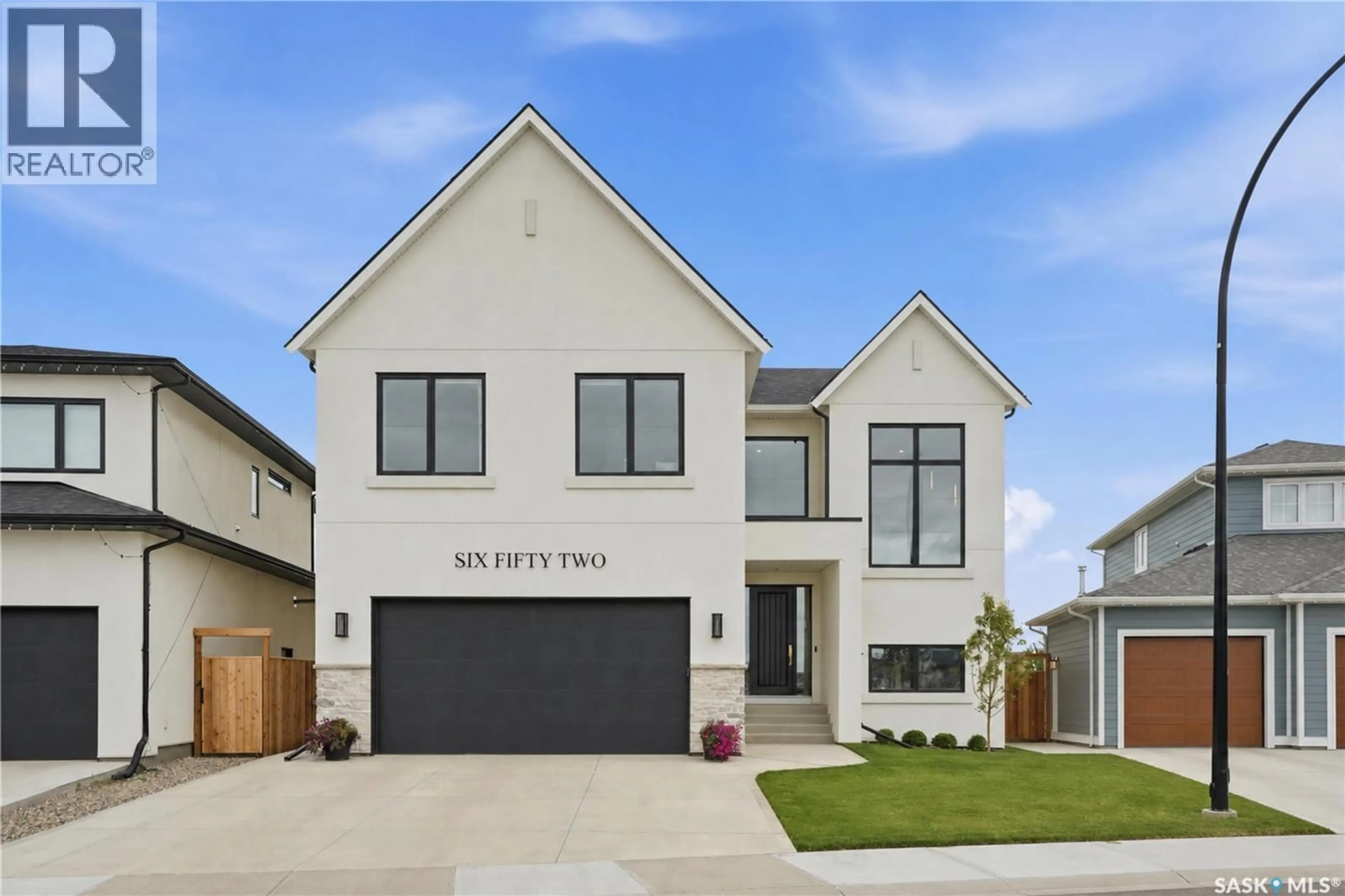 Home with vinyl exterior material, street for 652 PEPPER BEND, Saskatoon Saskatchewan S7V1T3