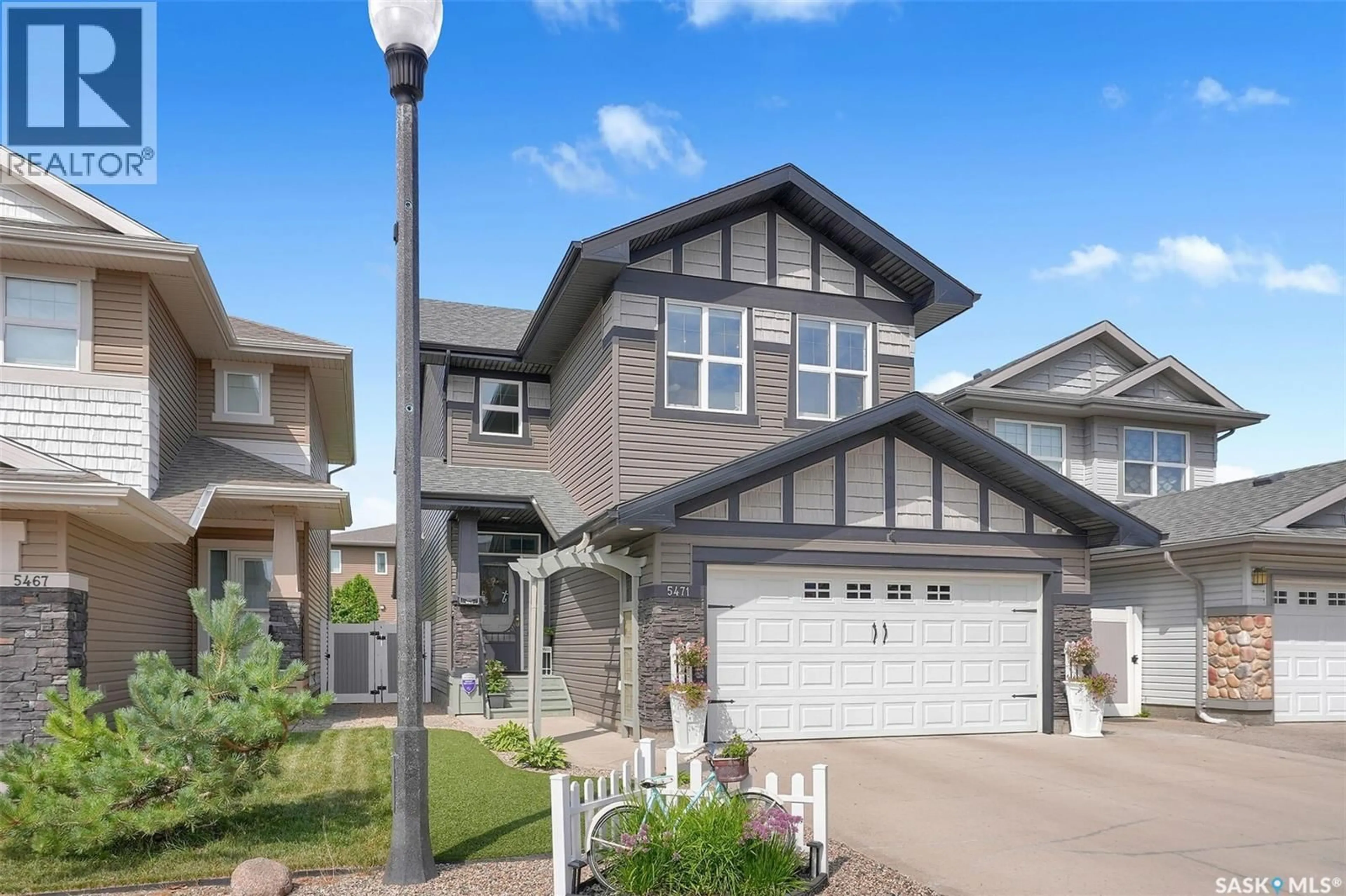 Home with vinyl exterior material, street for 5471 UNIVERSAL CRESCENT, Regina Saskatchewan S4W0K8