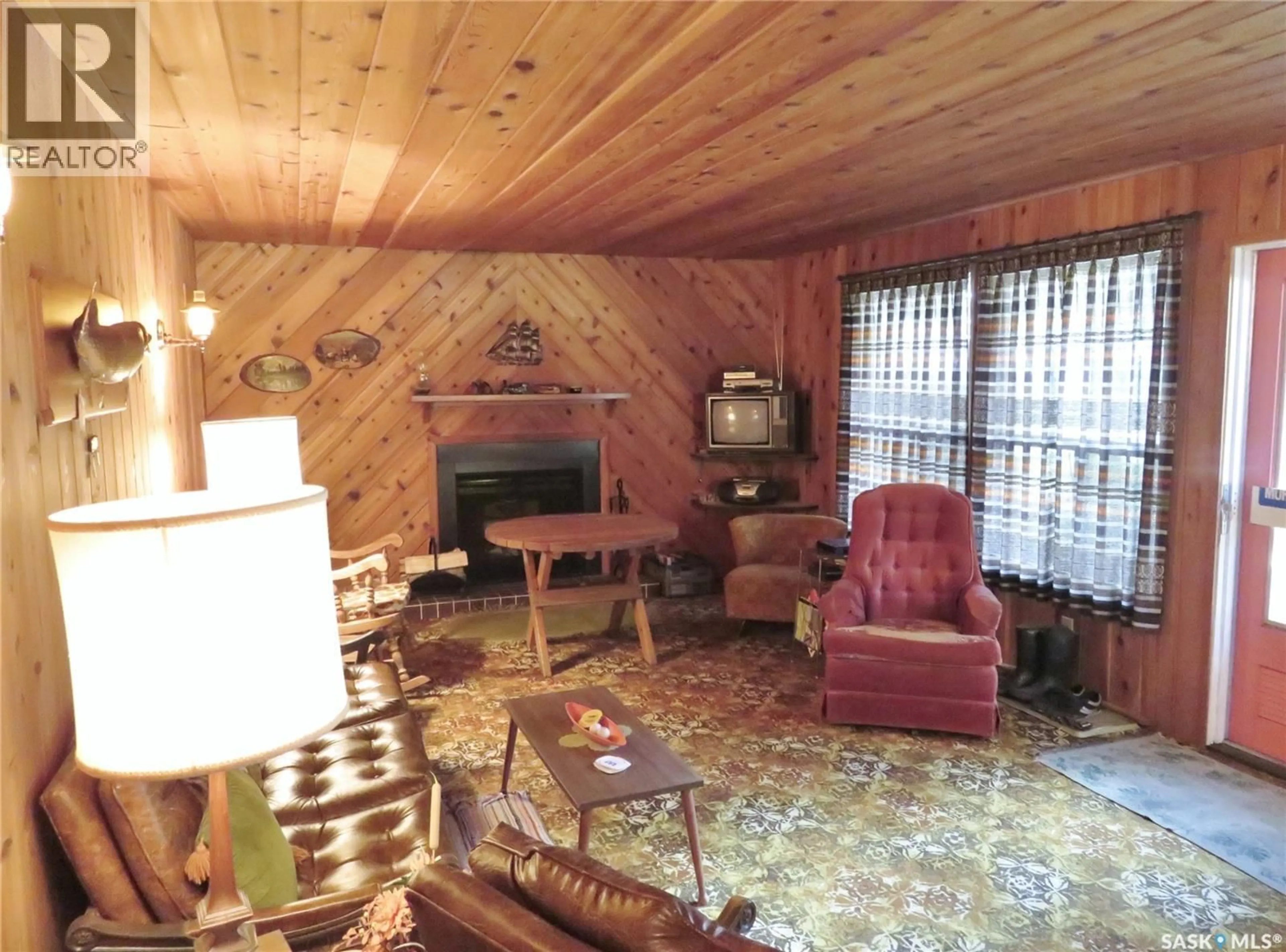 Living room with furniture, unknown for 99 CHAMAKESE ROAD, Chitek Lake Saskatchewan S0J0L0