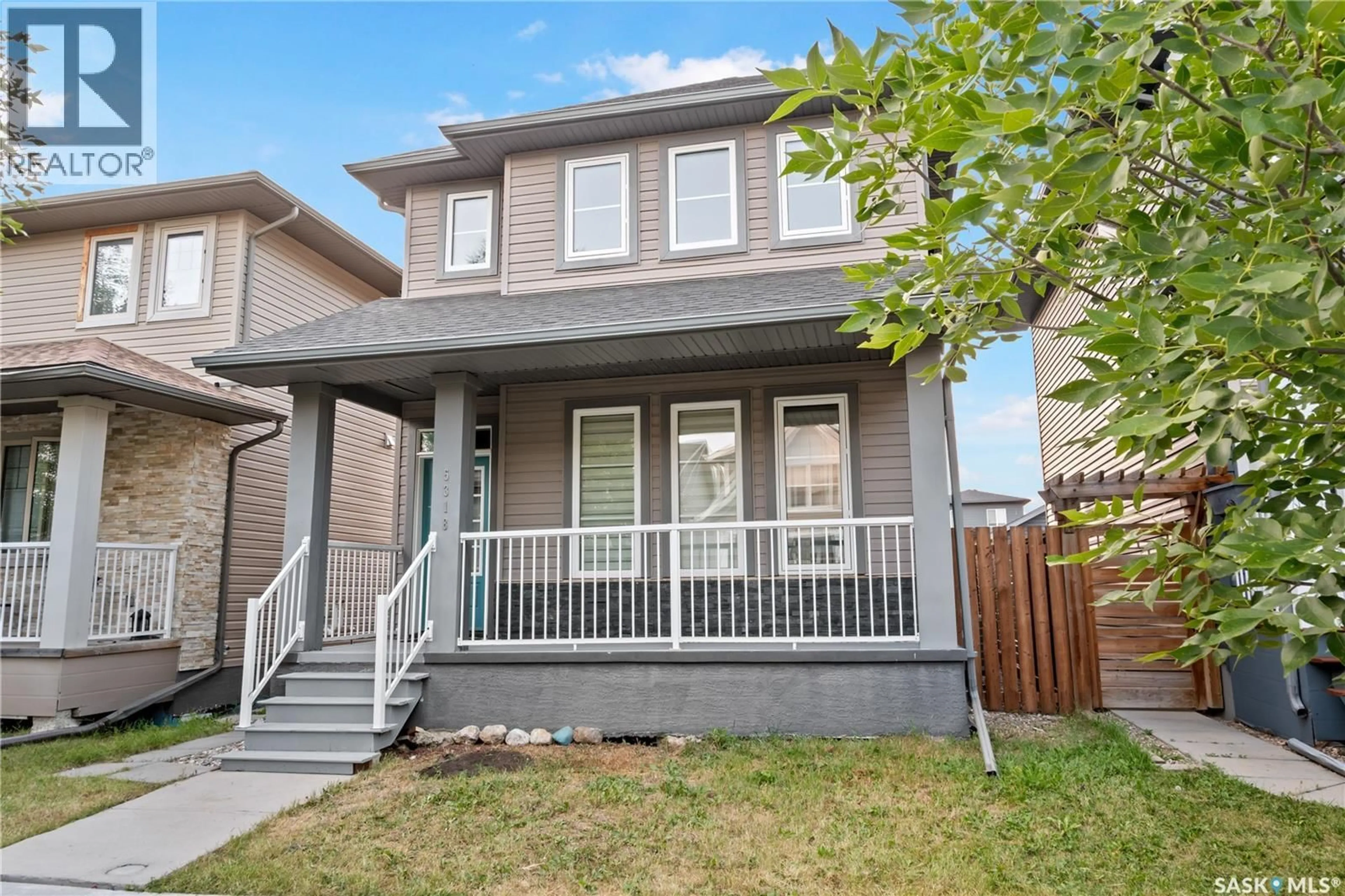 Home with vinyl exterior material, street for 5318 WHEREATT ROAD, Regina Saskatchewan S4W0N3