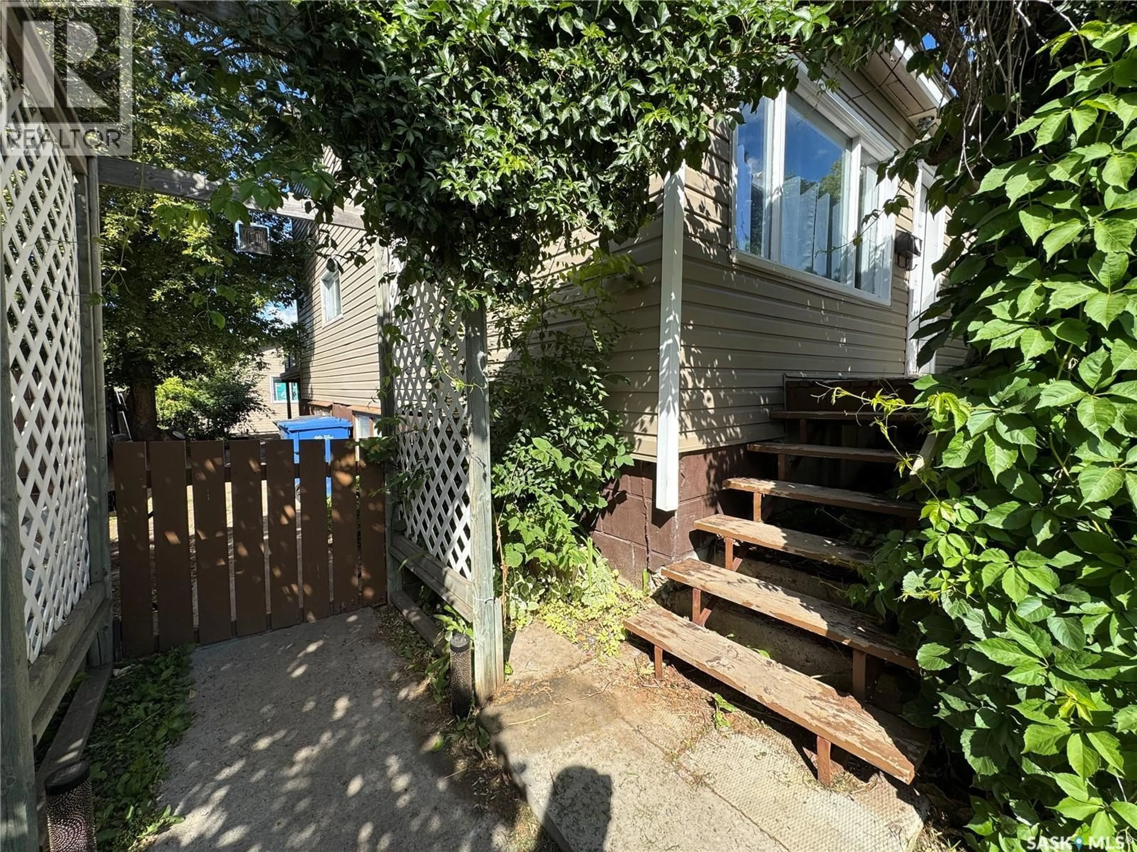 A pic from outside/outdoor area/front of a property/back of a property/a pic from drone, street for 1671 103RD STREET, North Battleford Saskatchewan S9A1L6