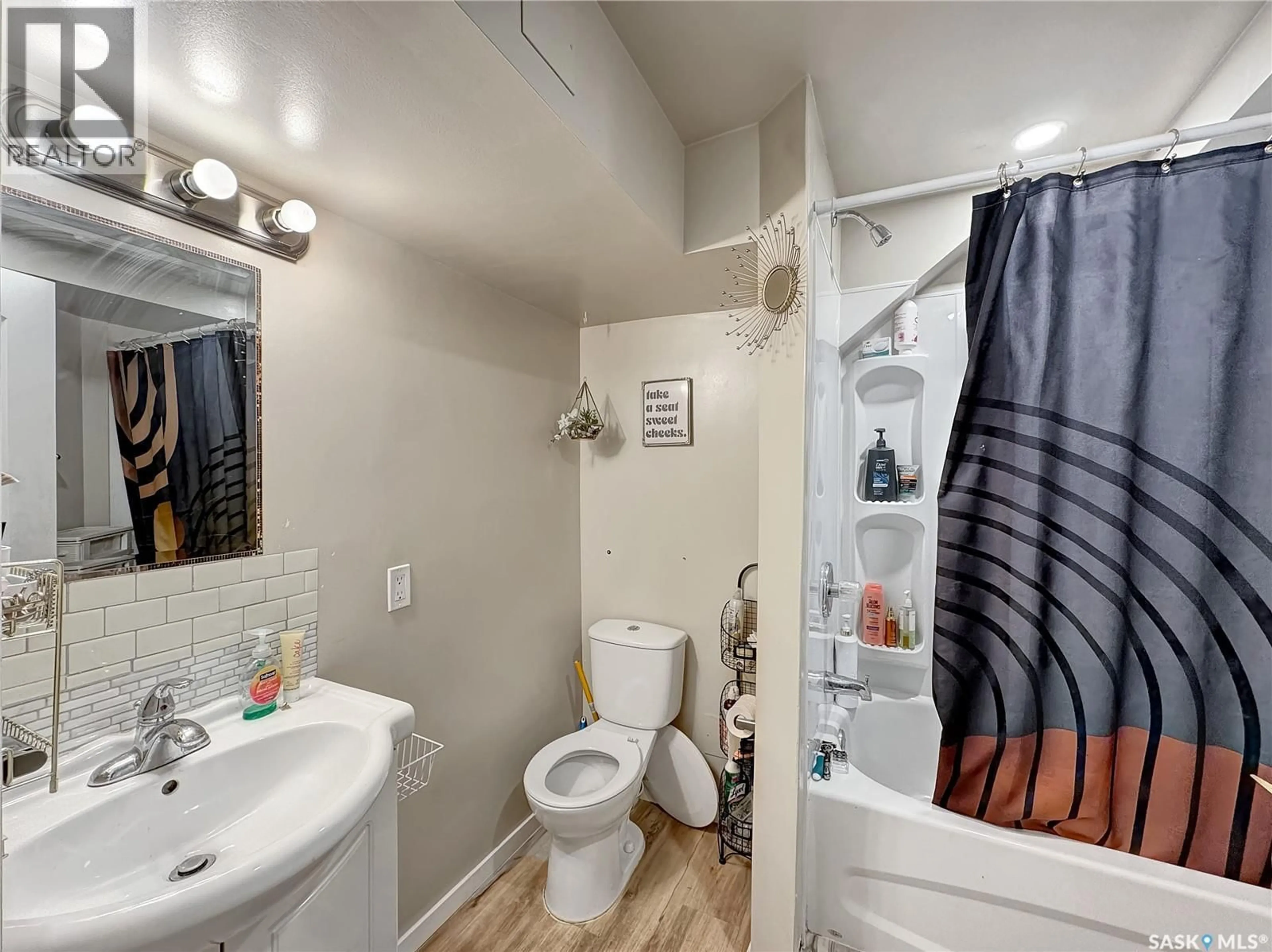 Standard bathroom, ceramic/tile floor for 1671 103RD STREET, North Battleford Saskatchewan S9A1L6