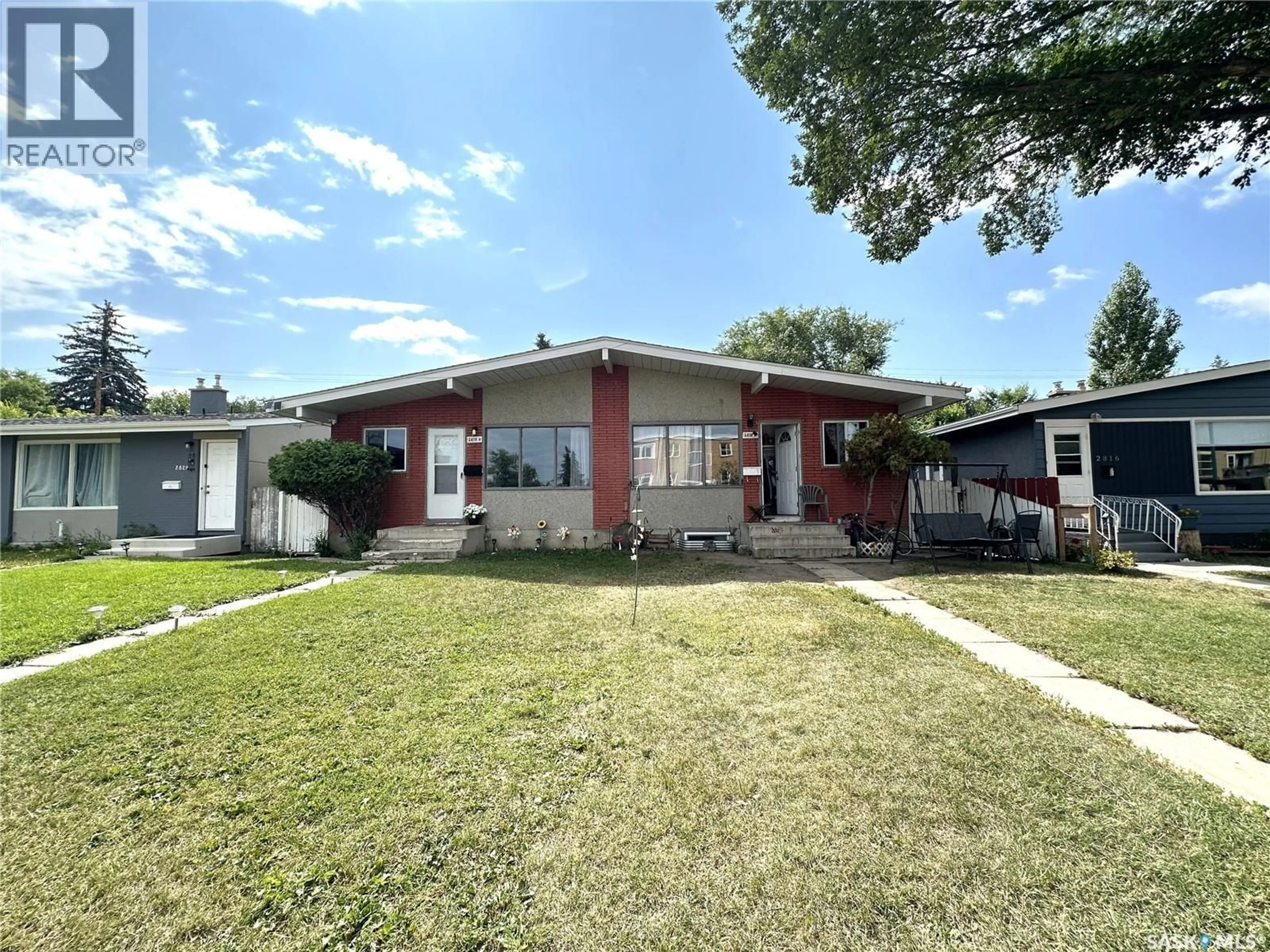 Home with vinyl exterior material, street for A&B - 2818 7TH STREET, Saskatoon Saskatchewan S7H1A9