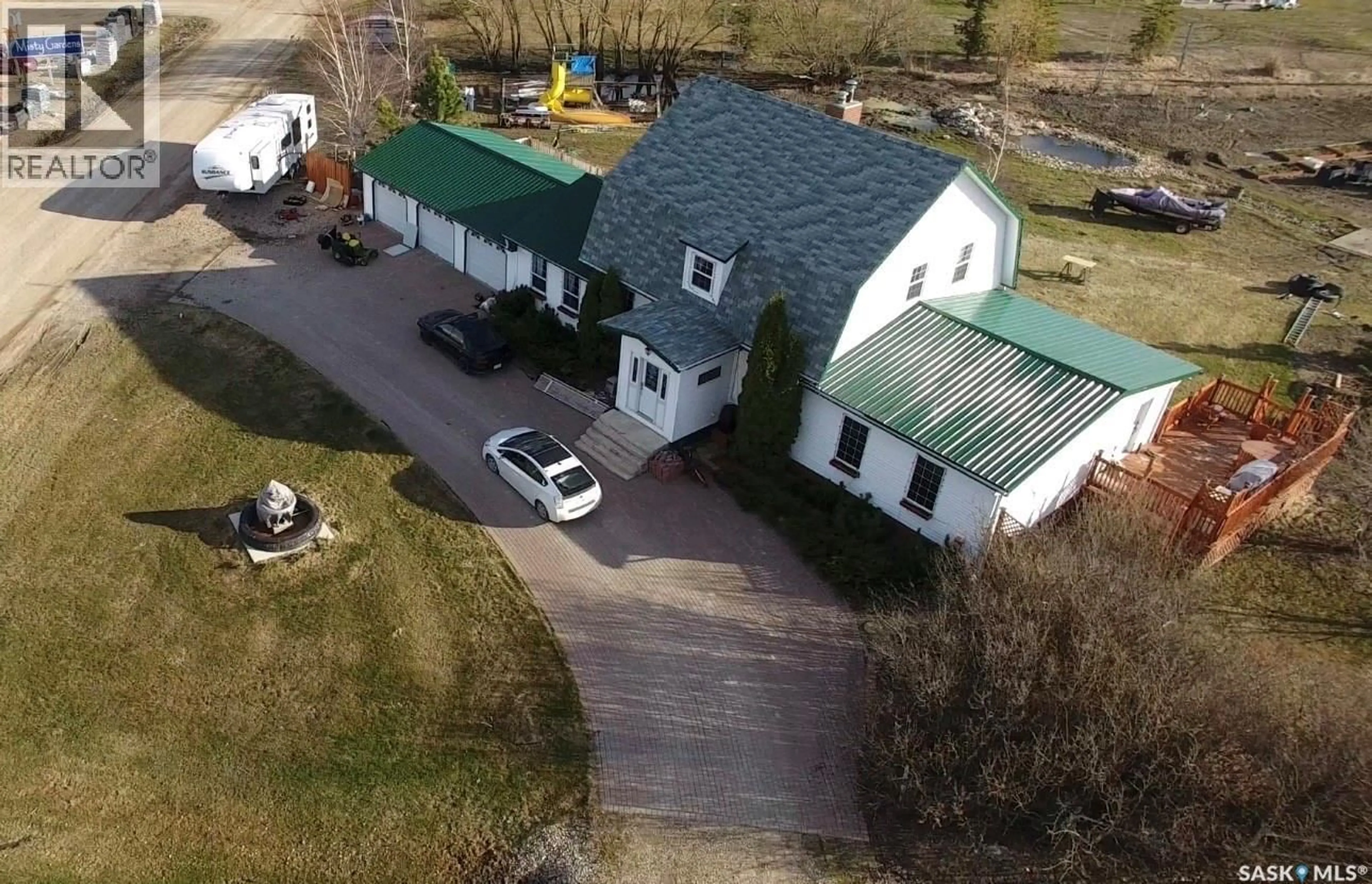 A pic from outside/outdoor area/front of a property/back of a property/a pic from drone, building for 10460 6TH AVENUE, Humboldt Saskatchewan S7K5L3