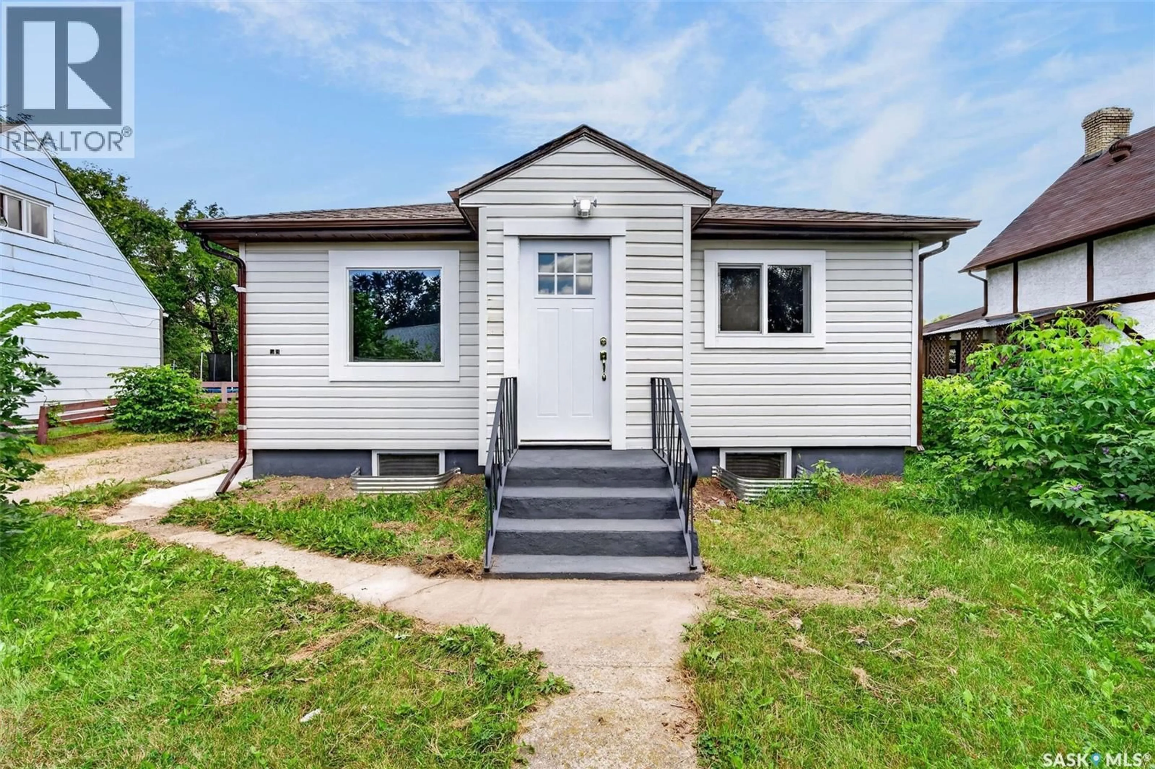 Home with vinyl exterior material, street for 584 7TH STREET, Prince Albert Saskatchewan S6V0S5