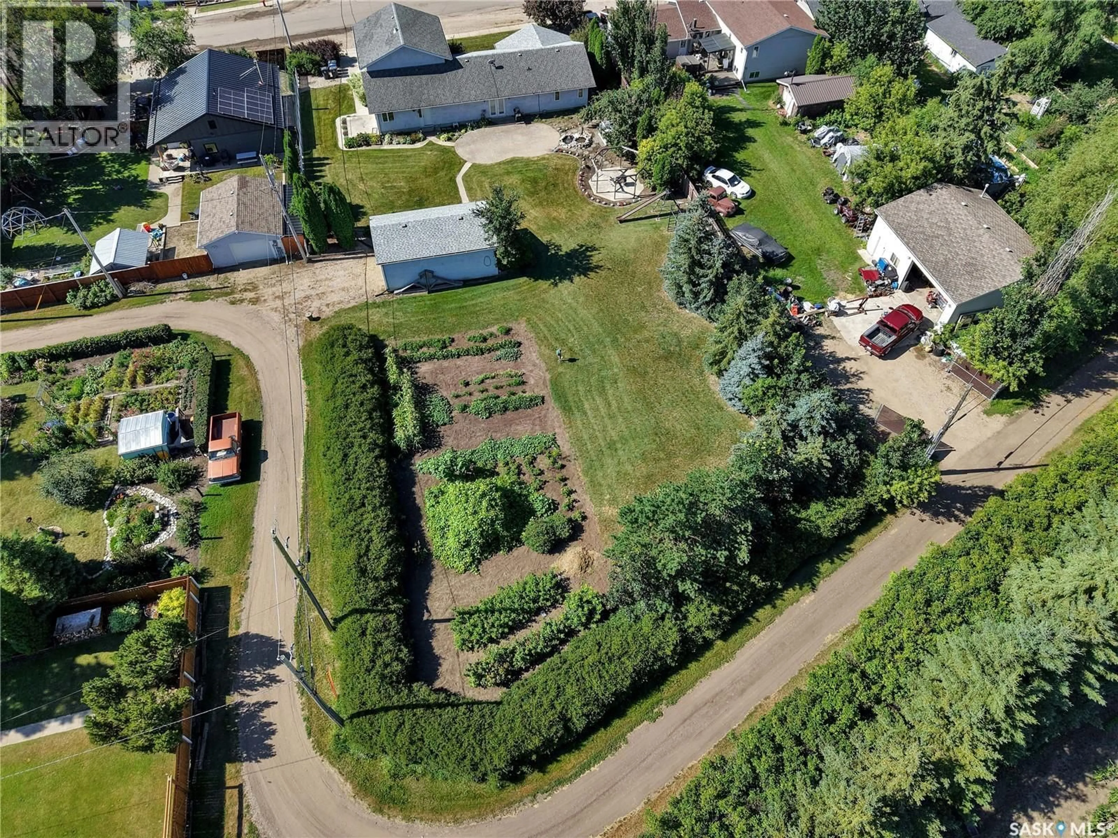 A pic from outside/outdoor area/front of a property/back of a property/a pic from drone, street for 201 CENTENNIAL ROAD, Hague Saskatchewan S0K1X0