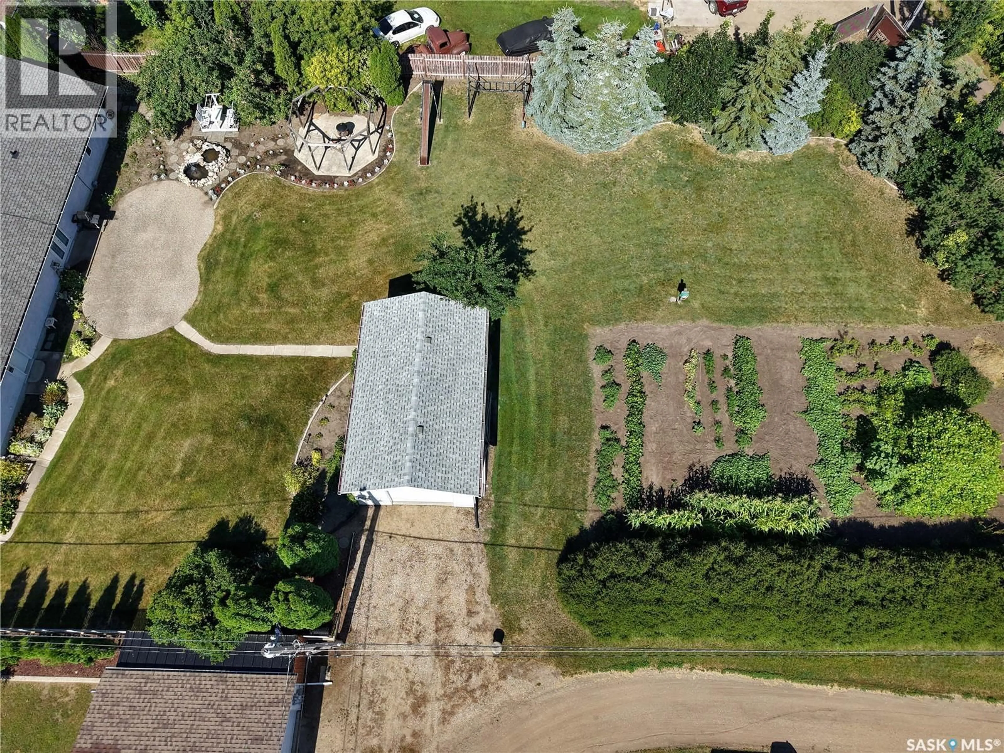 A pic from outside/outdoor area/front of a property/back of a property/a pic from drone, street for 201 CENTENNIAL ROAD, Hague Saskatchewan S0K1X0