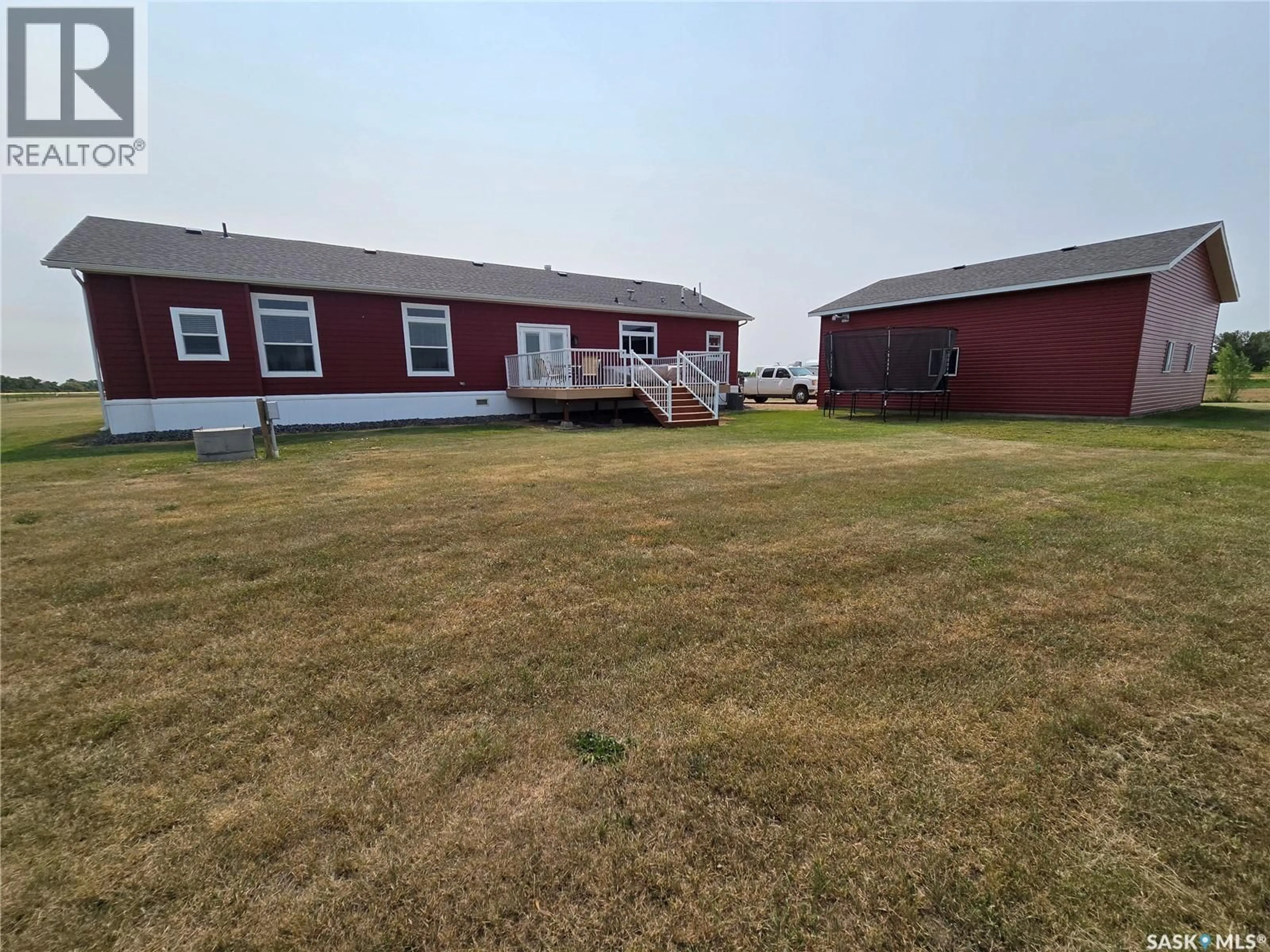 A pic from outside/outdoor area/front of a property/back of a property/a pic from drone, building for EBERTS ACREAGE, Weyburn Rm No. 67 Saskatchewan S4H2J9
