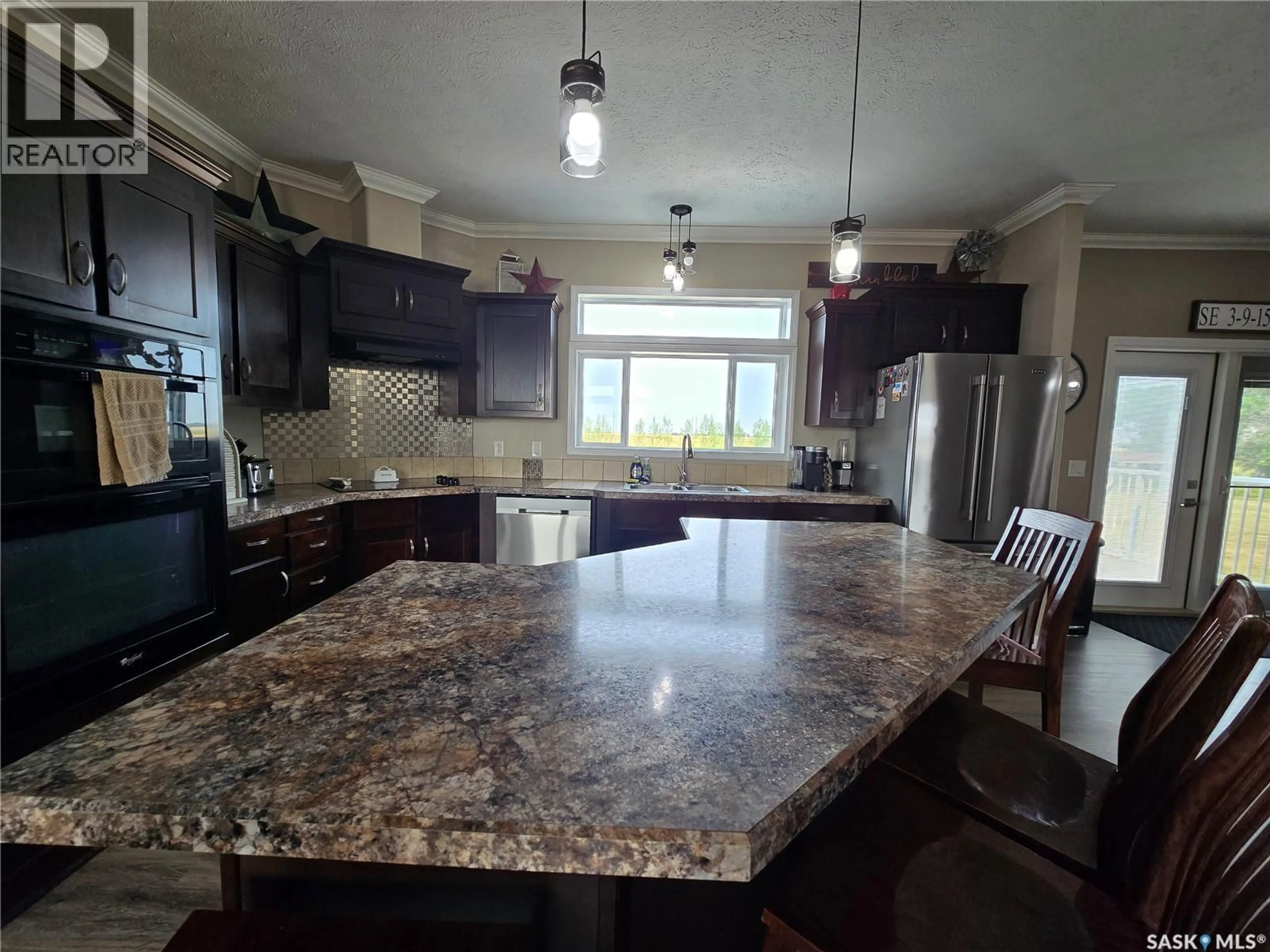 Open concept kitchen, ceramic/tile floor for EBERTS ACREAGE, Weyburn Rm No. 67 Saskatchewan S4H2J9