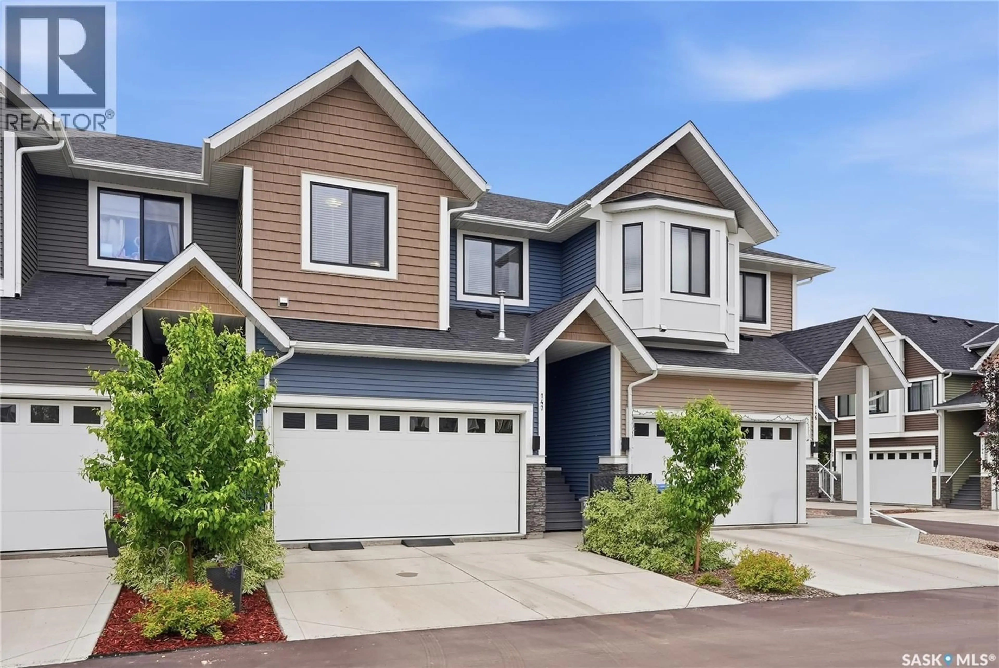 Home with vinyl exterior material, street for 147 3220 11TH STREET, Saskatoon Saskatchewan S7M5M4