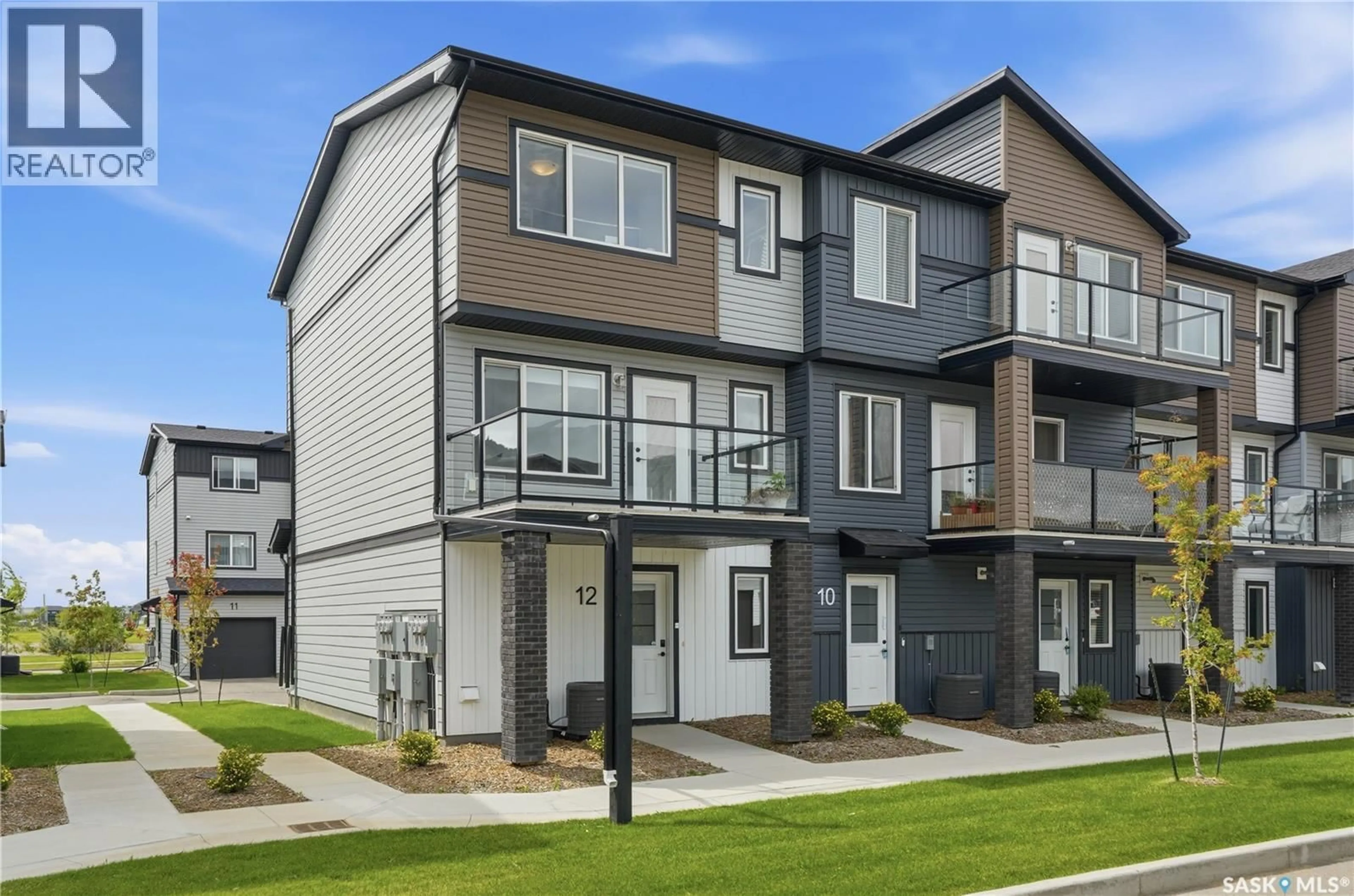 Home with vinyl exterior material, street for 12 651 DUBOIS CRESCENT, Saskatoon Saskatchewan S7V0R3