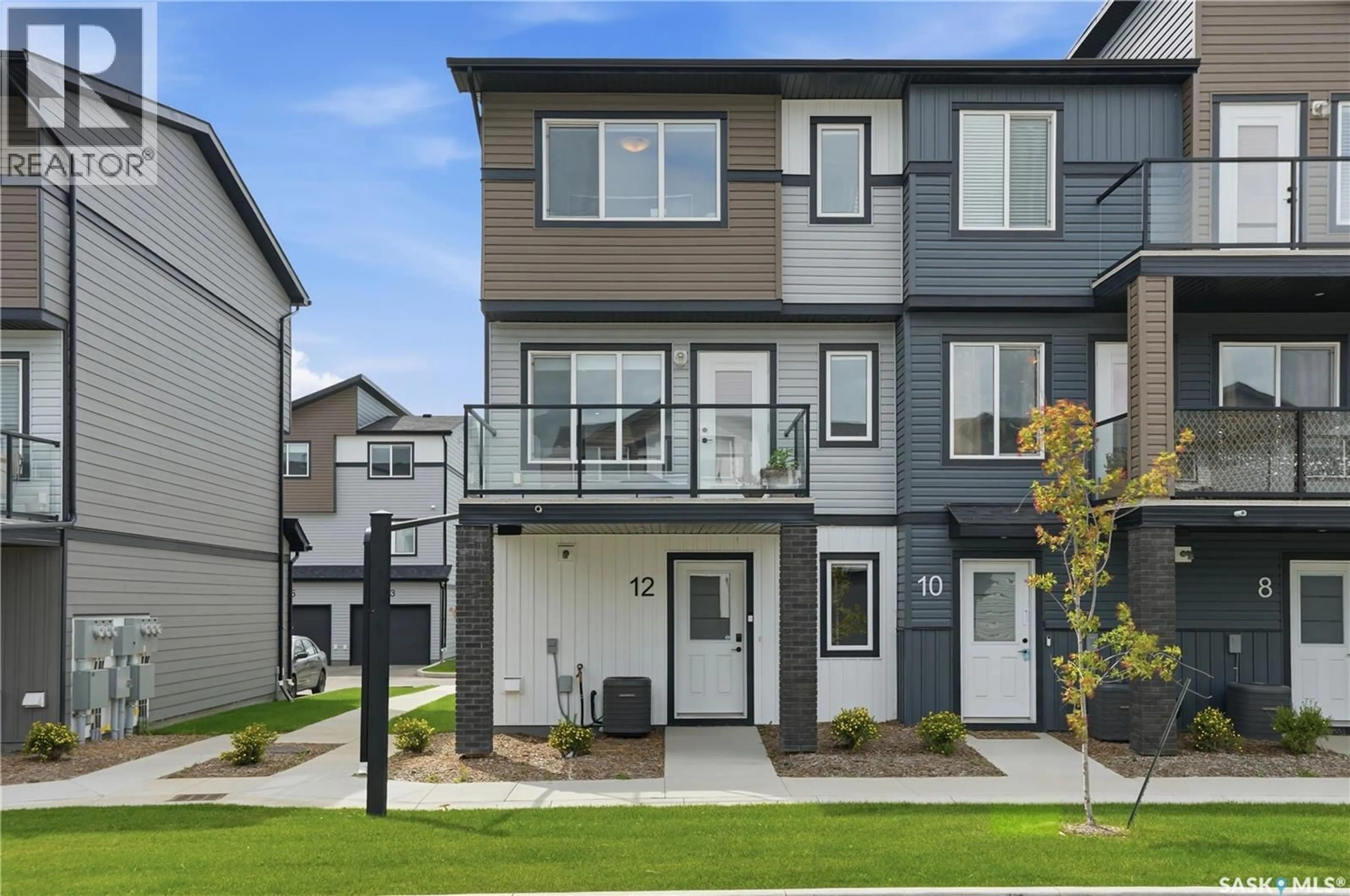 Home with vinyl exterior material, street for 12 651 DUBOIS CRESCENT, Saskatoon Saskatchewan S7V0R3