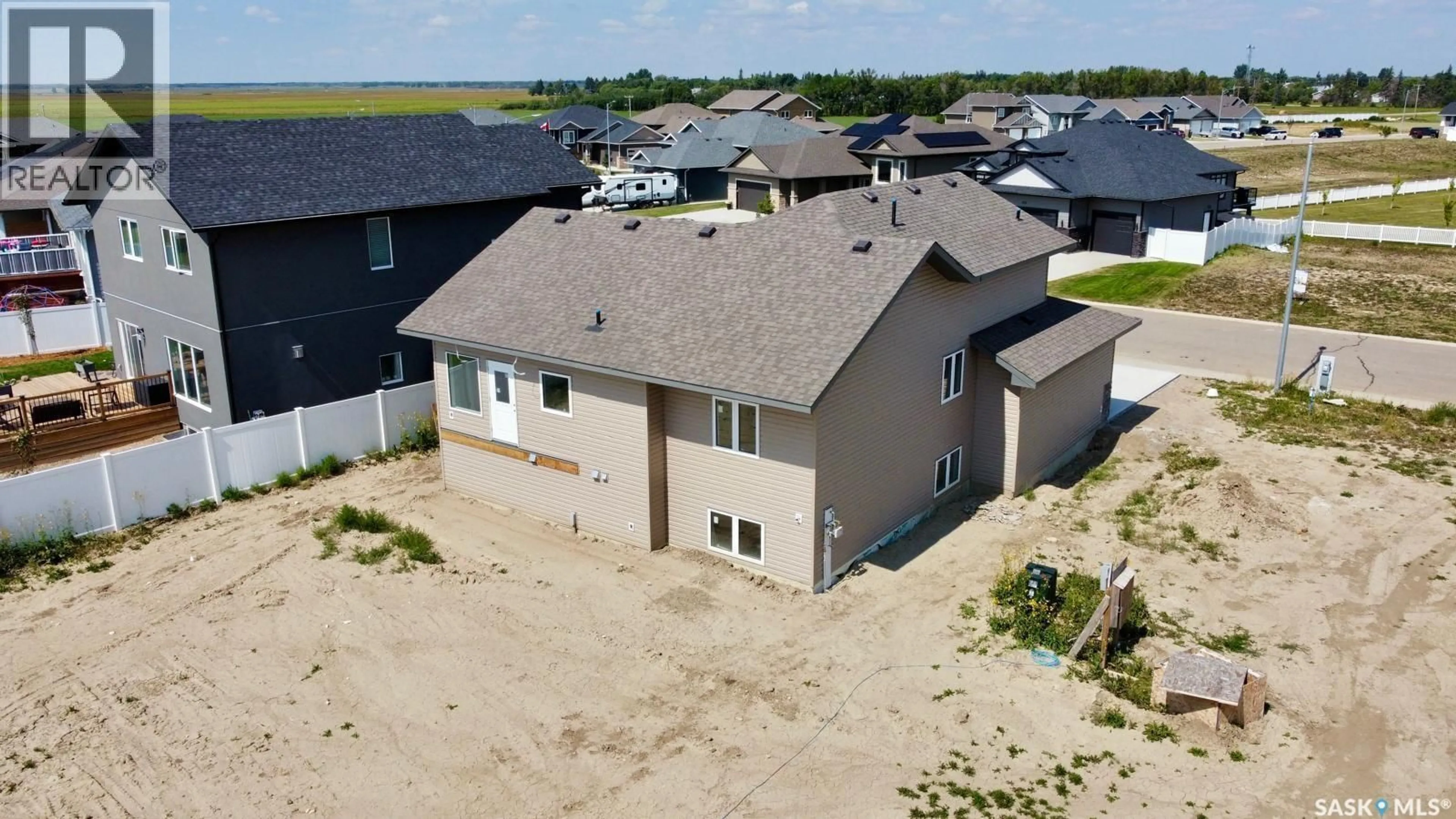 A pic from outside/outdoor area/front of a property/back of a property/a pic from drone, building for 408 PRAIRIE VIEW DRIVE, Dundurn Saskatchewan S0K1K1