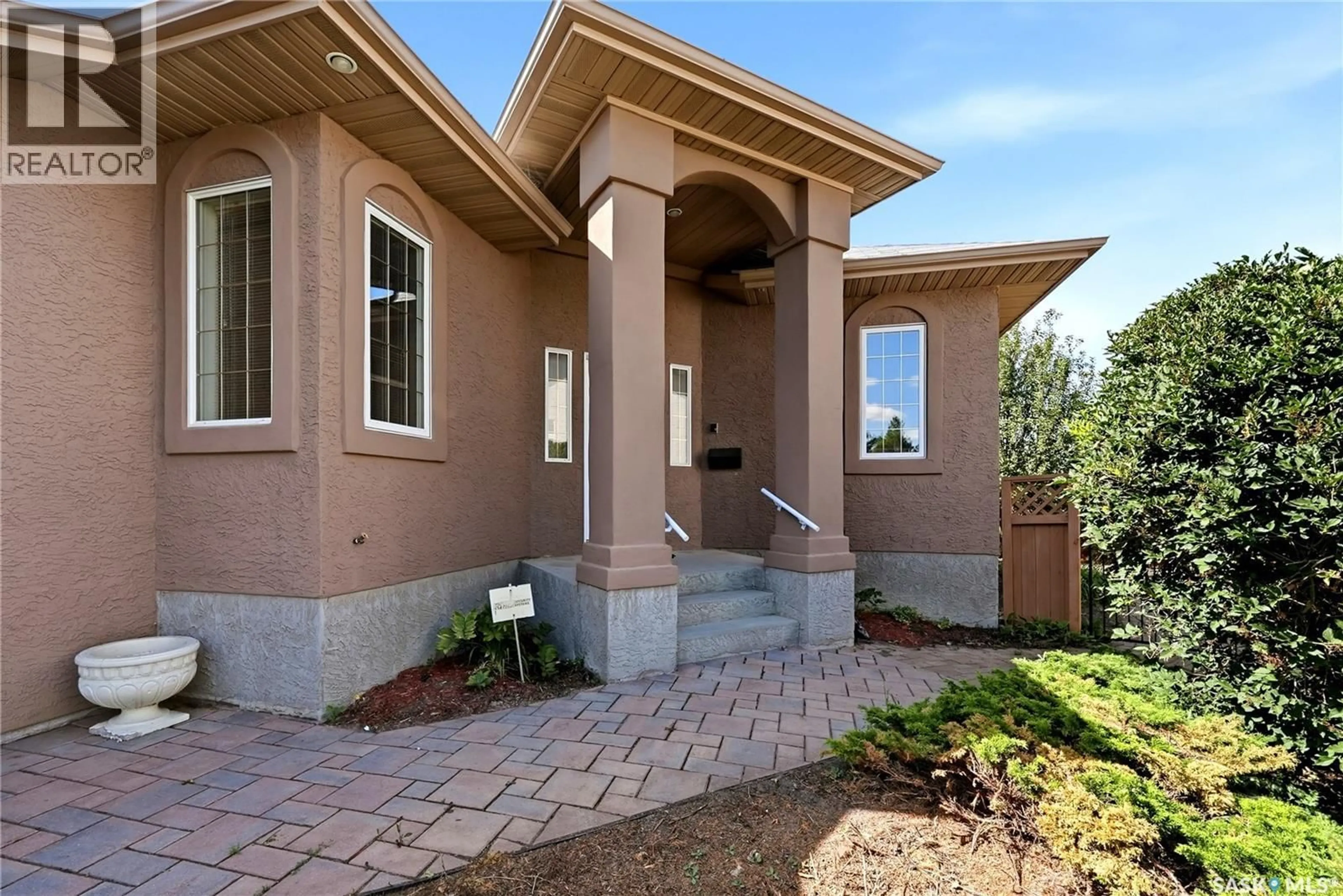 Home with brick exterior material, street for 11330 WASCANA MEADOWS, Regina Saskatchewan S4V2V4