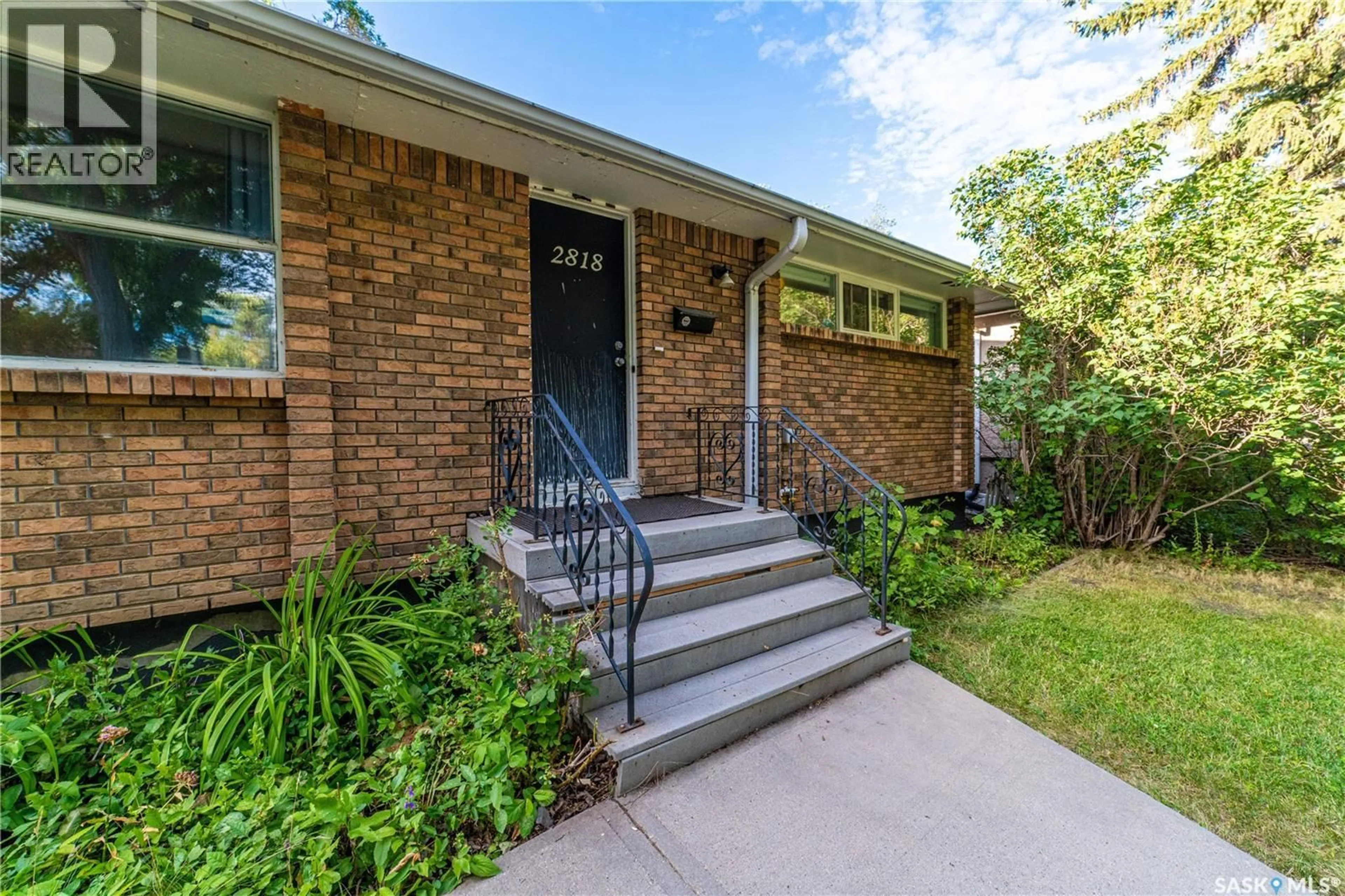 Home with brick exterior material, street for 2818 23RD AVENUE, Regina Saskatchewan S4S1E6