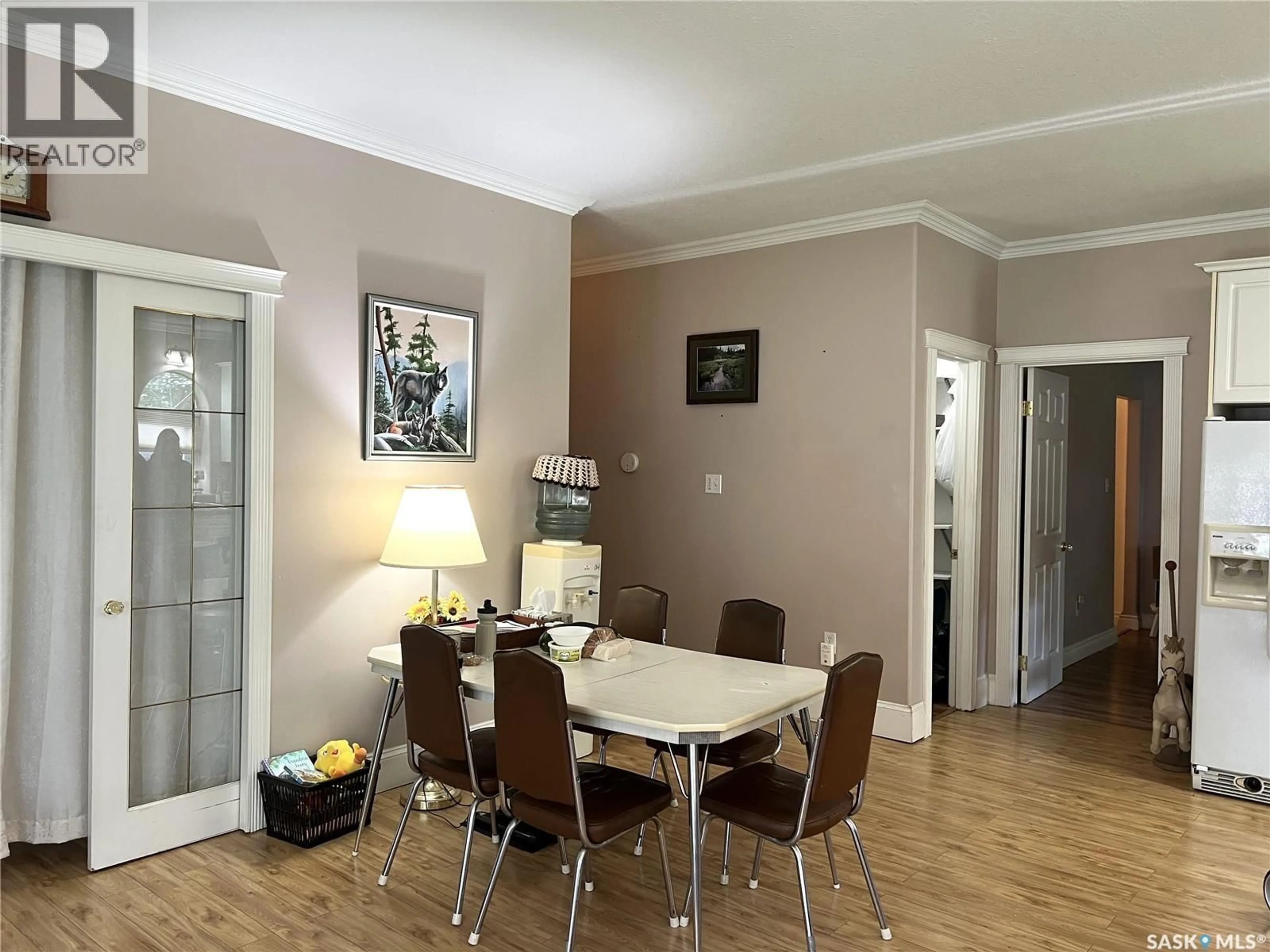 Dining room, wood/laminate floor for 1 - 501 CENTRE STREET, Meadow Lake Saskatchewan S9X1E5