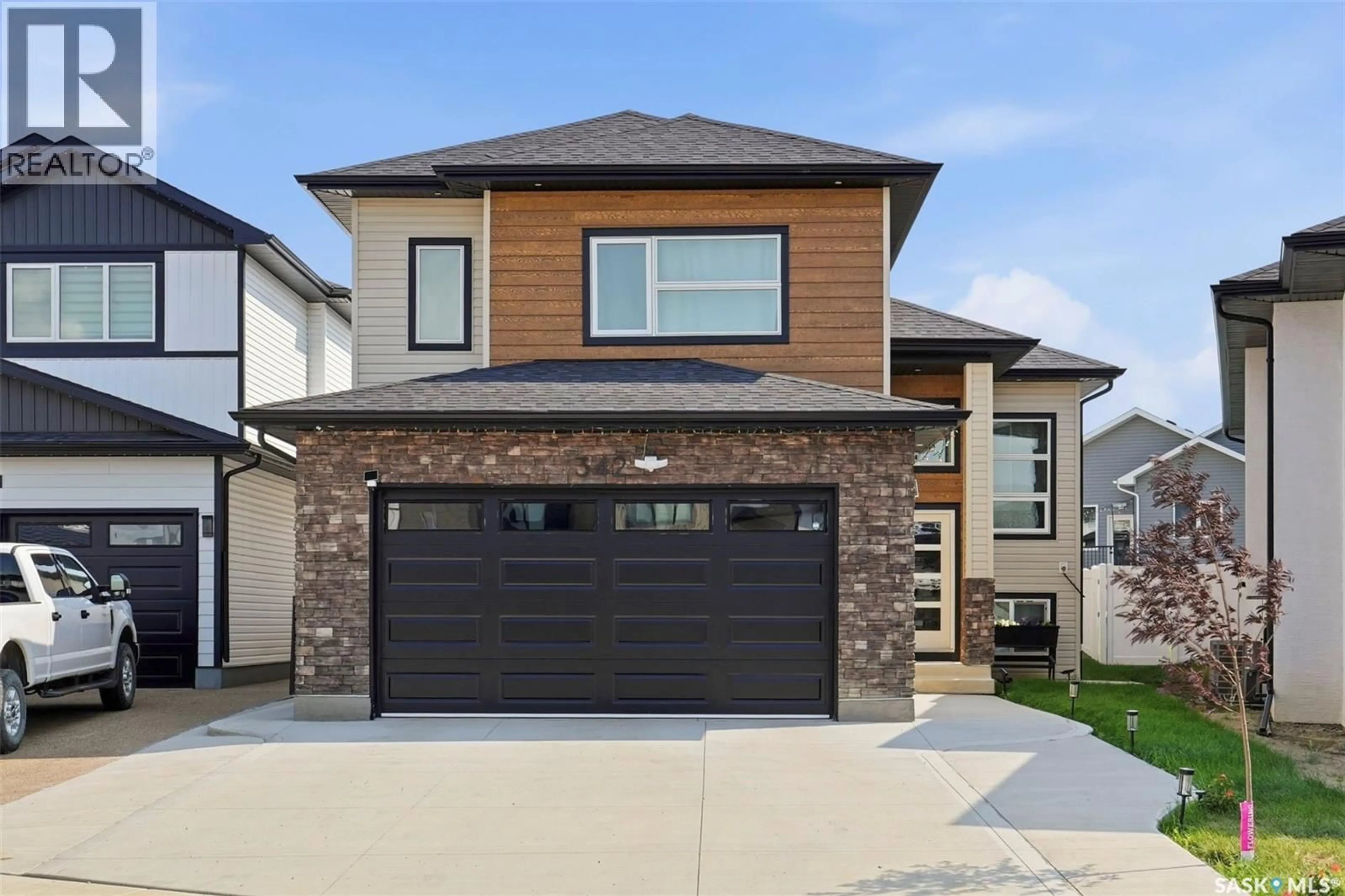 Home with brick exterior material, street for 342 SHARMA CRESCENT, Saskatoon Saskatchewan S7W1K9