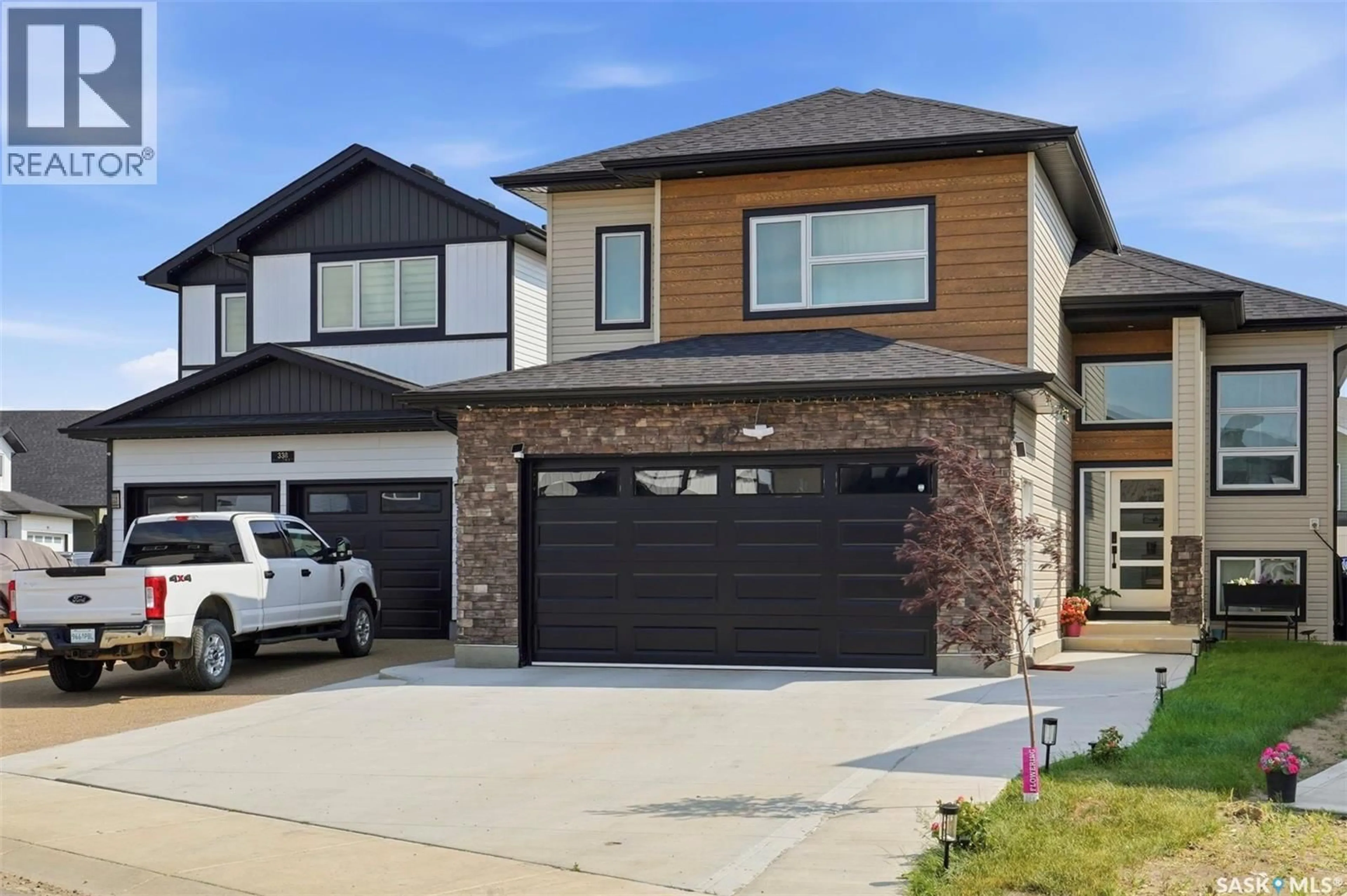Home with brick exterior material, street for 342 SHARMA CRESCENT, Saskatoon Saskatchewan S7W1K9