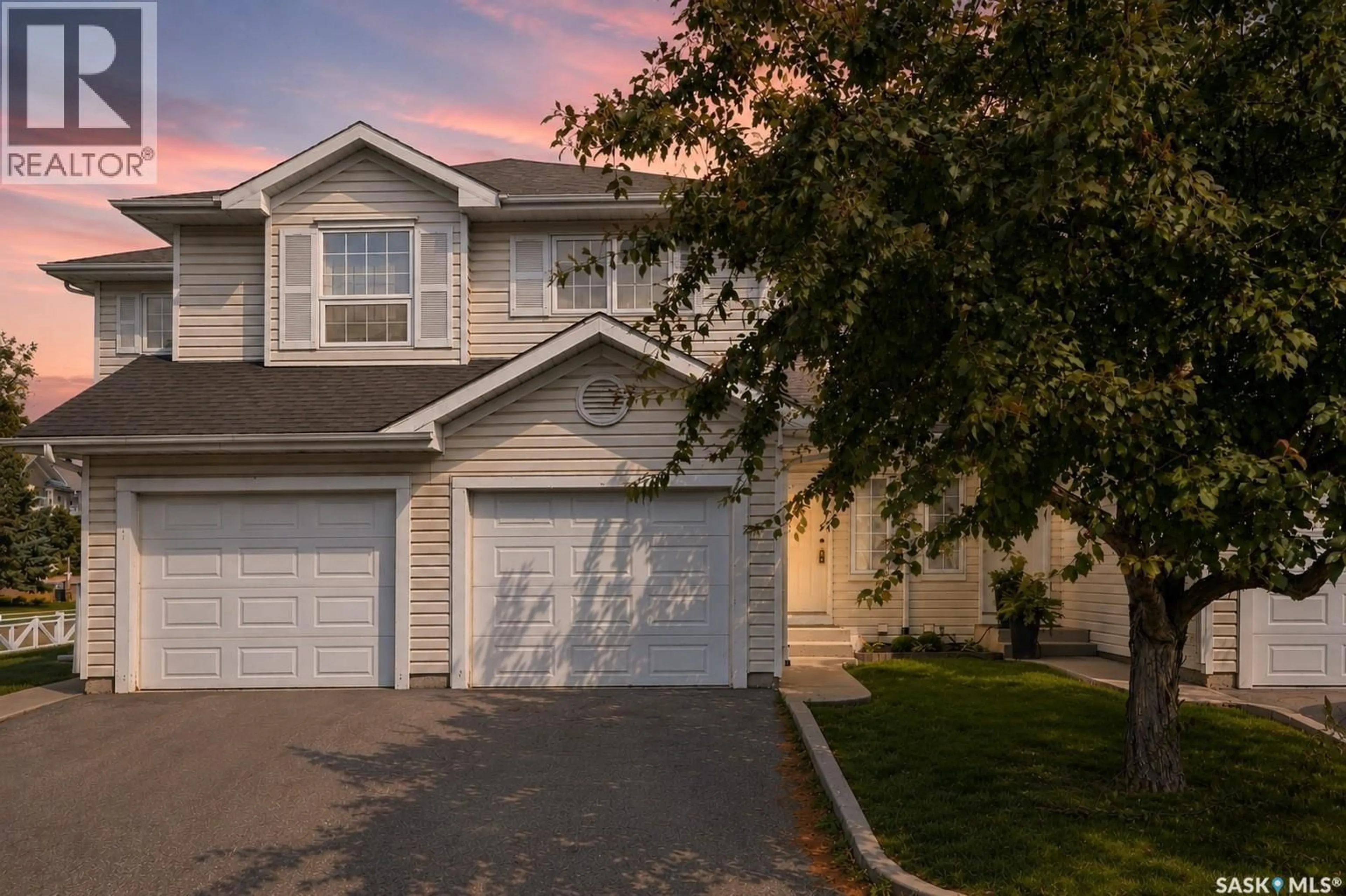 Home with vinyl exterior material, street for 2 110 KEEVIL CRESCENT, Saskatoon Saskatchewan S7N4N8