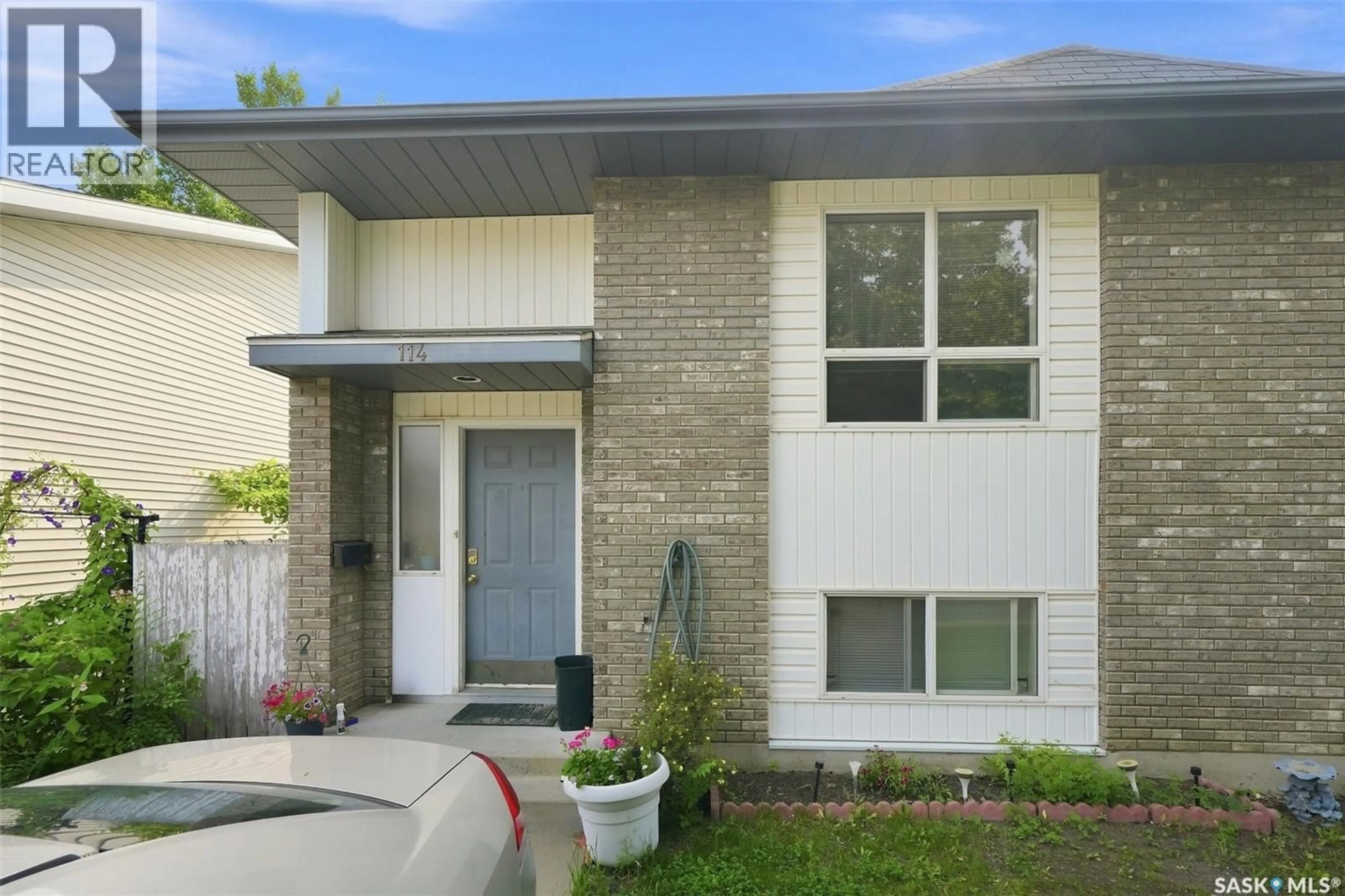 Home with brick exterior material, street for 114 - 116 BARBER CRESCENT, Saskatoon Saskatchewan S7M5M7