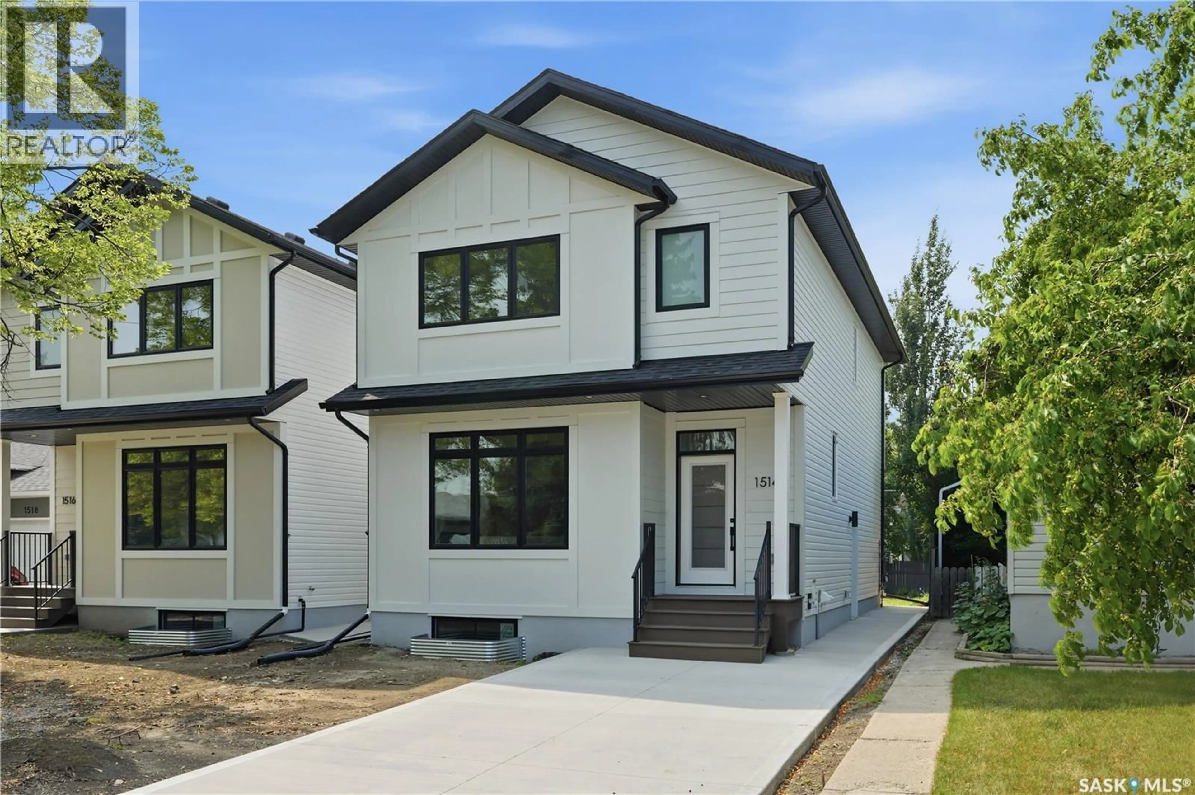 Home with vinyl exterior material, street for 1514 EWART AVENUE, Saskatoon Saskatchewan S7H2K8