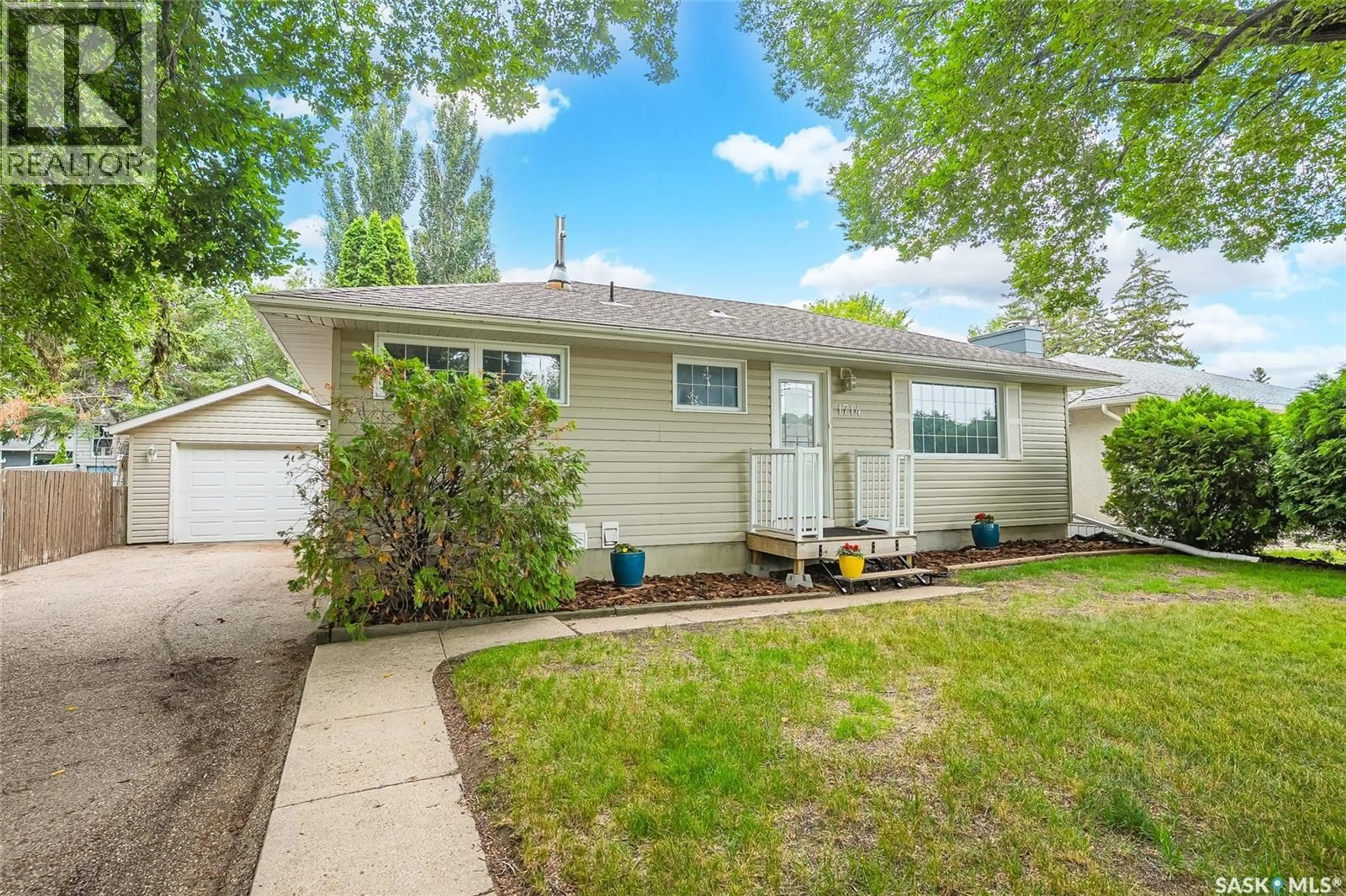 Home with vinyl exterior material, street for 1714 DRINKLE STREET, Saskatoon Saskatchewan S7J0P7