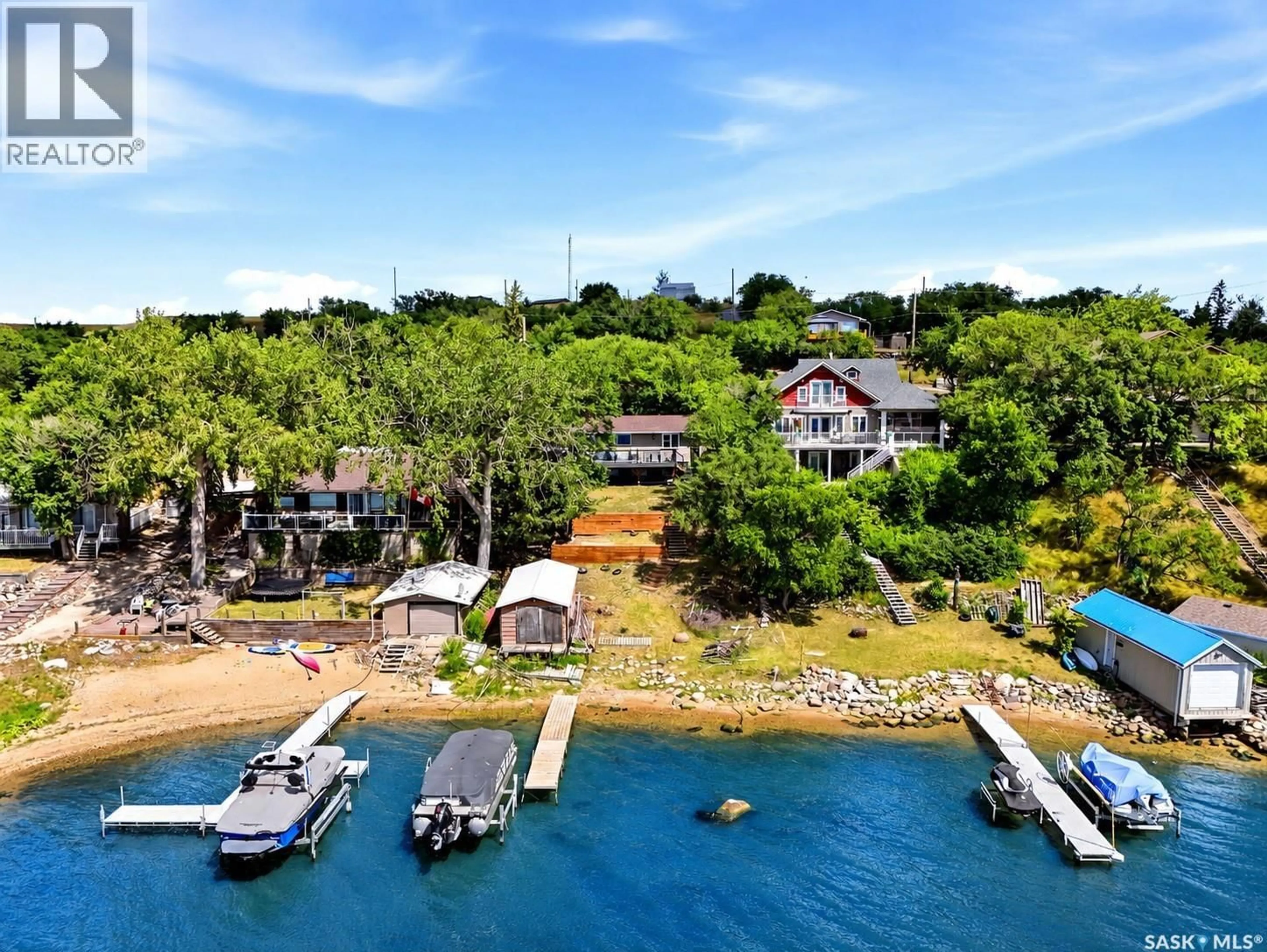 A pic from outside/outdoor area/front of a property/back of a property/a pic from drone, water/lake/river/ocean view for 61 PELICAN DRIVE, Pelican Pointe Saskatchewan S0G4L0