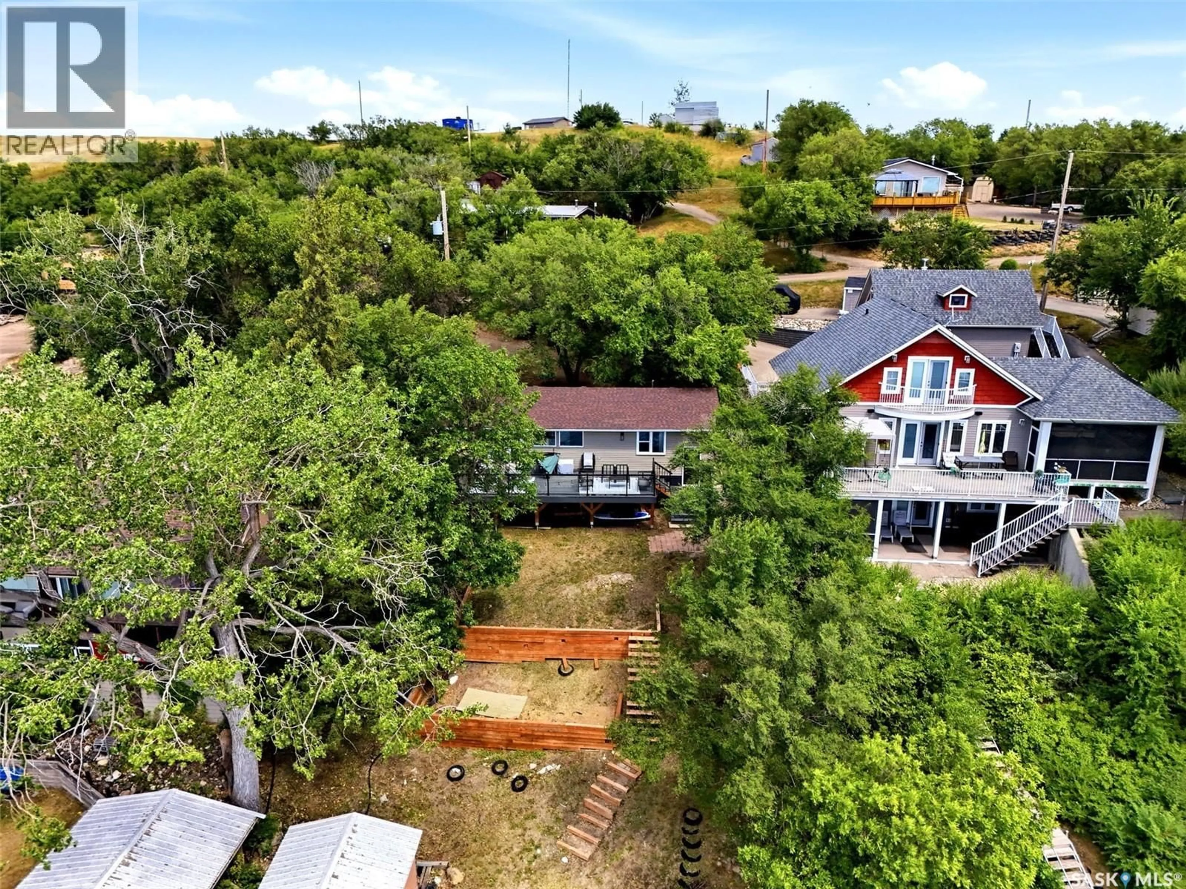 A pic from outside/outdoor area/front of a property/back of a property/a pic from drone, unknown for 61 PELICAN DRIVE, Pelican Pointe Saskatchewan S0G4L0