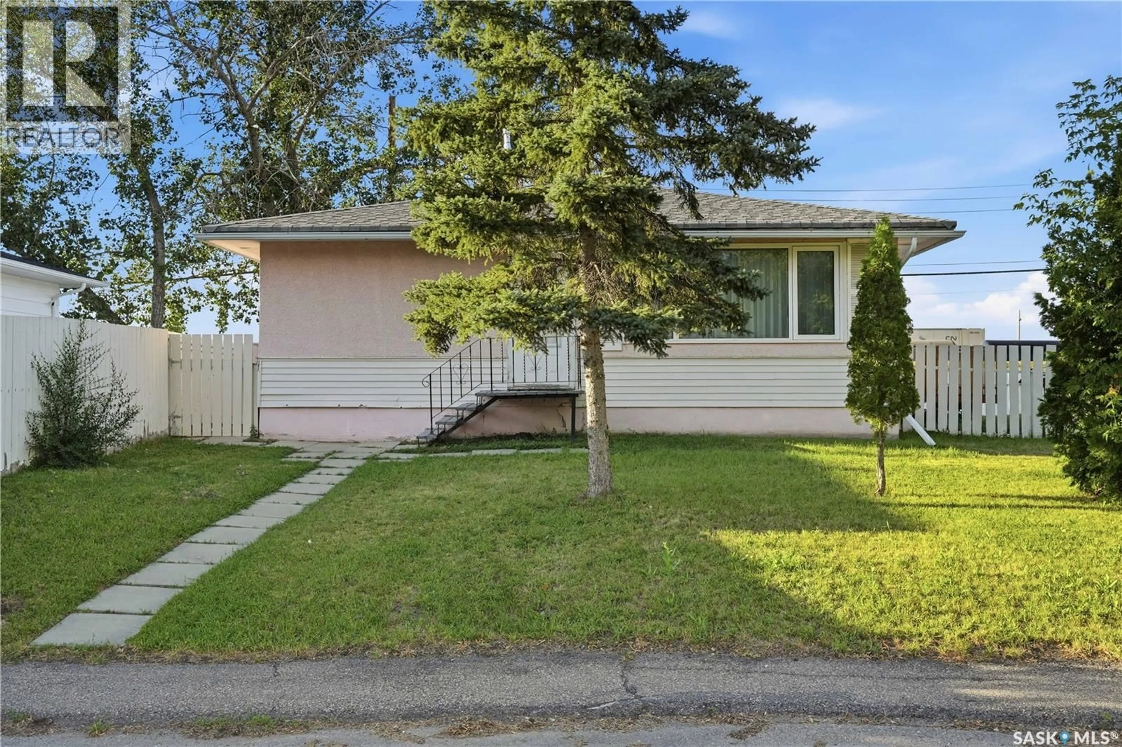 Home with vinyl exterior material, street for 4904 MCKINLEY AVENUE, Regina Saskatchewan S4T0A1