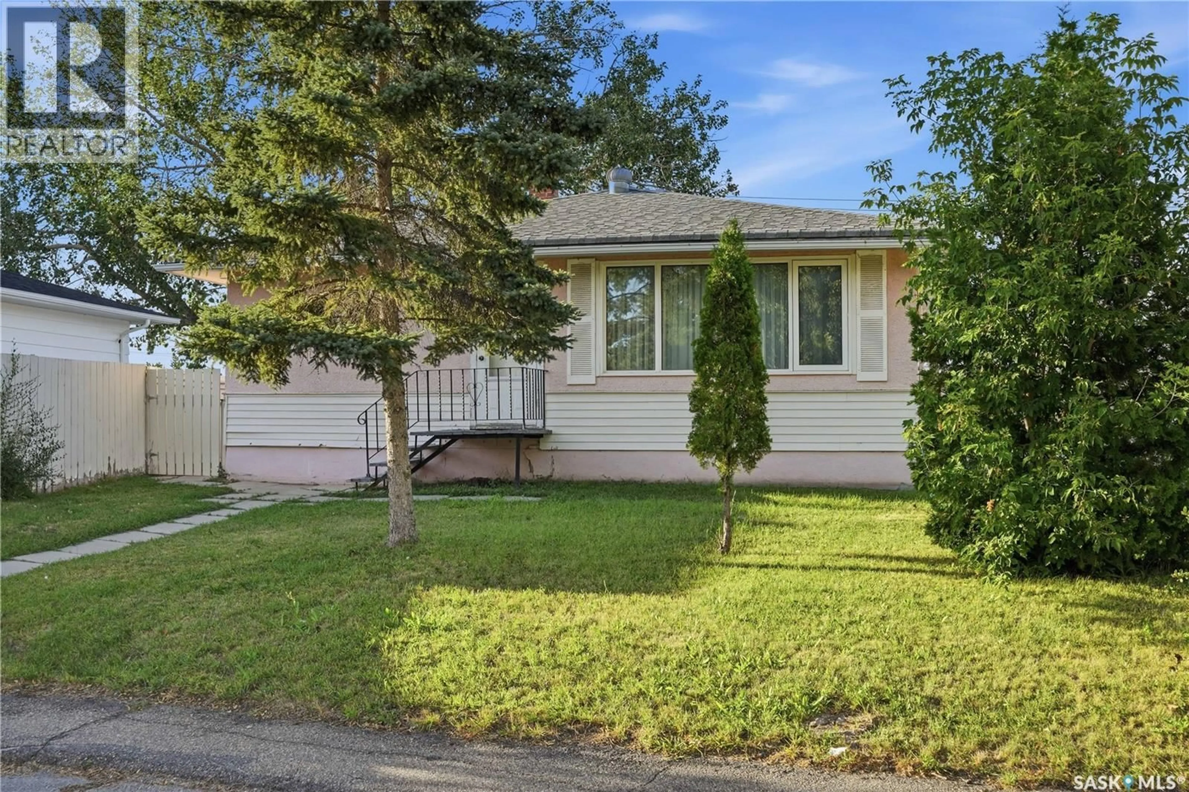 Home with vinyl exterior material, street for 4904 MCKINLEY AVENUE, Regina Saskatchewan S4T0A1