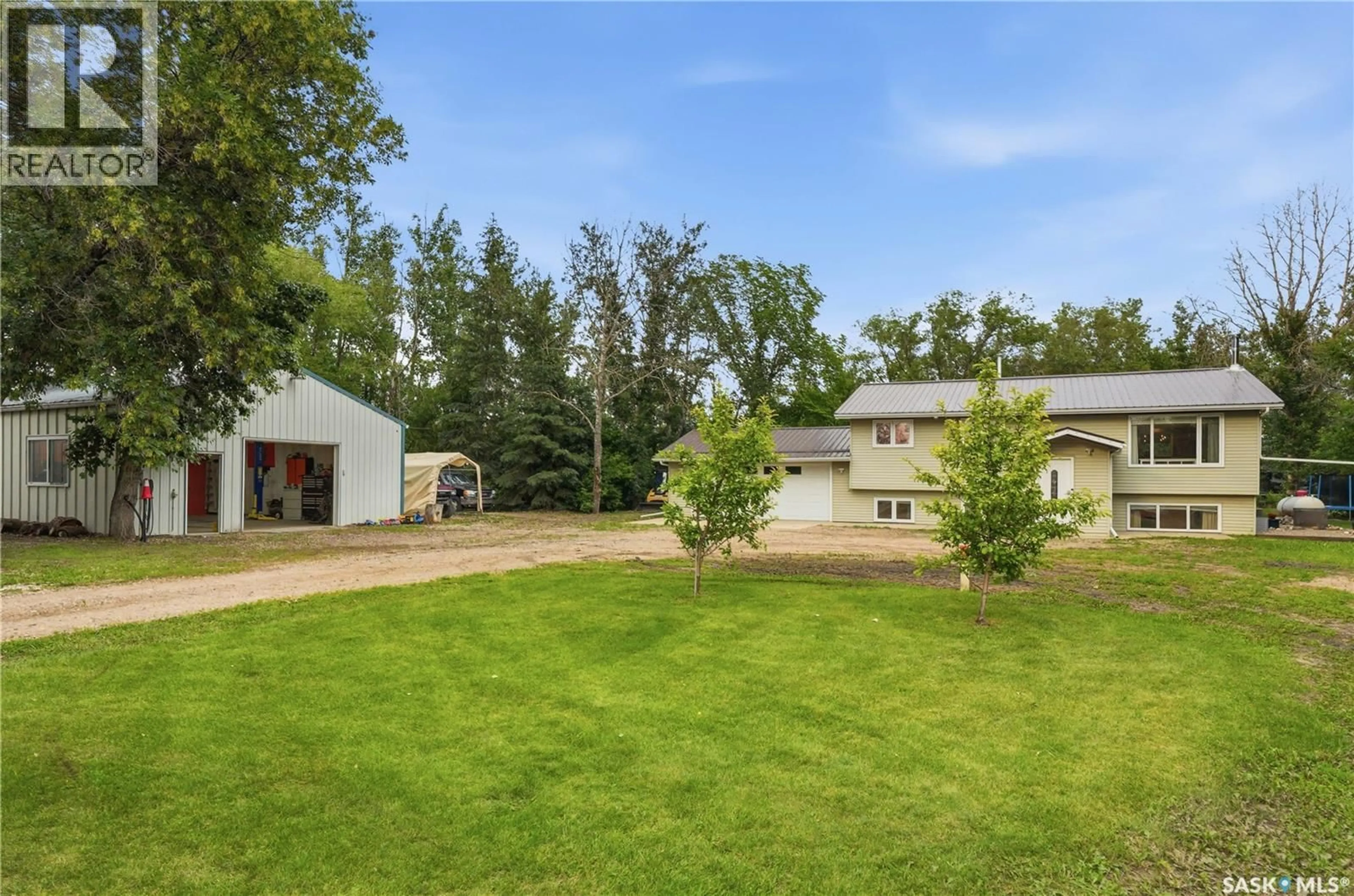 A pic from outside/outdoor area/front of a property/back of a property/a pic from drone, unknown for ACREAGE EAST, Corman Park Rm No. 344 Saskatchewan S7K3J8