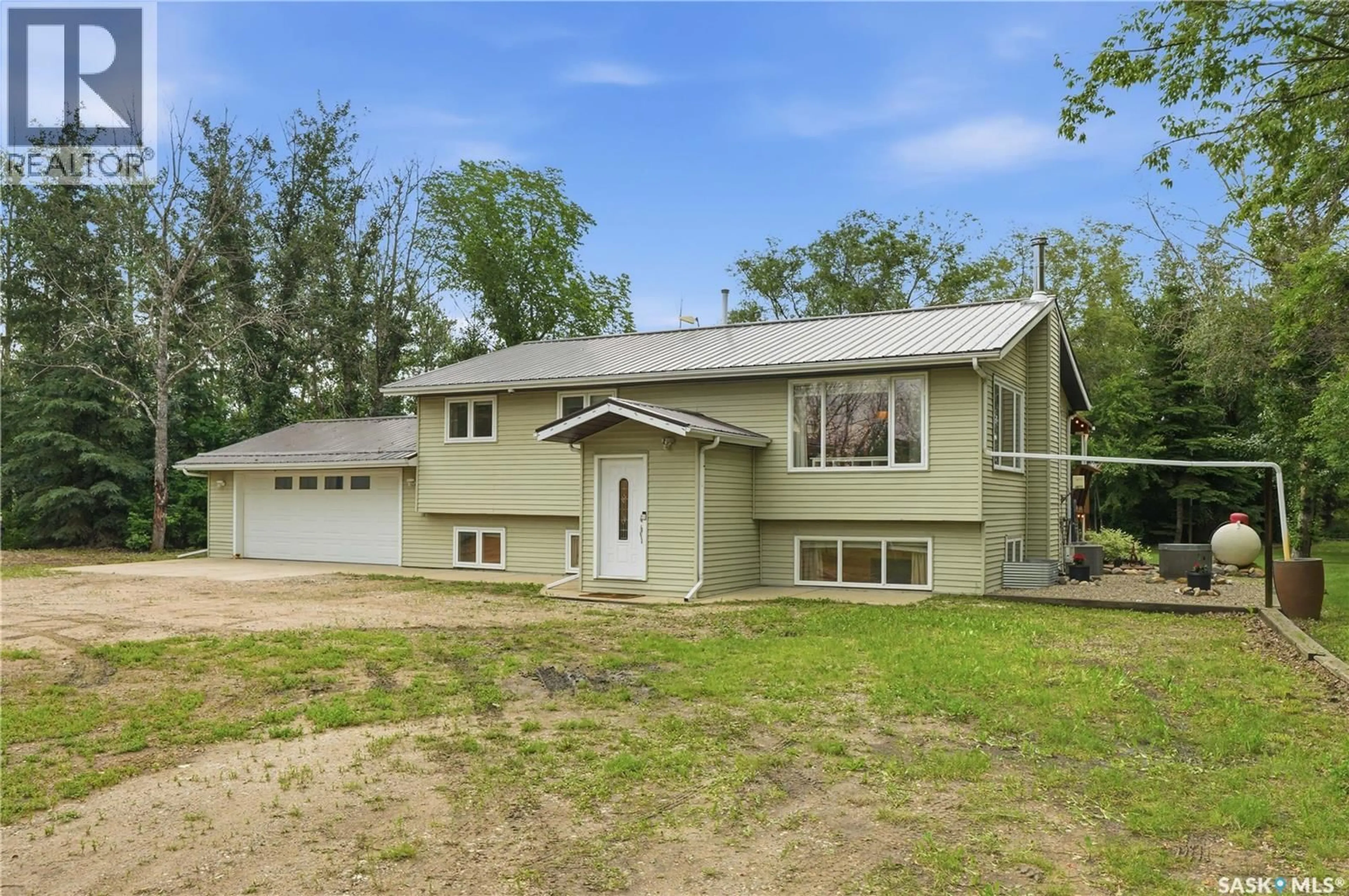 Home with vinyl exterior material, street for ACREAGE EAST, Corman Park Rm No. 344 Saskatchewan S7K3J8