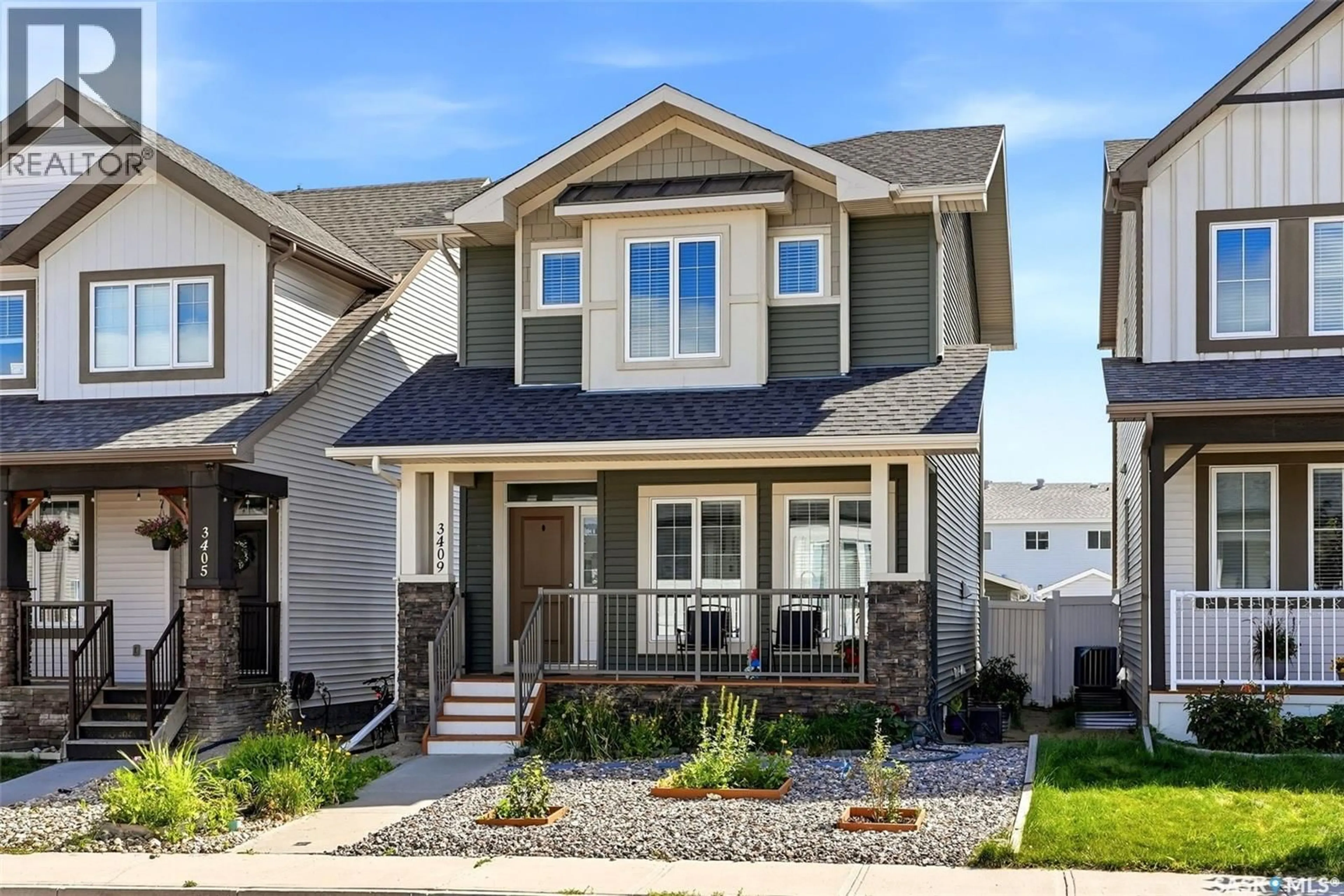 Home with vinyl exterior material, street for 3409 GREEN JADE LANE, Regina Saskatchewan S4V3K7