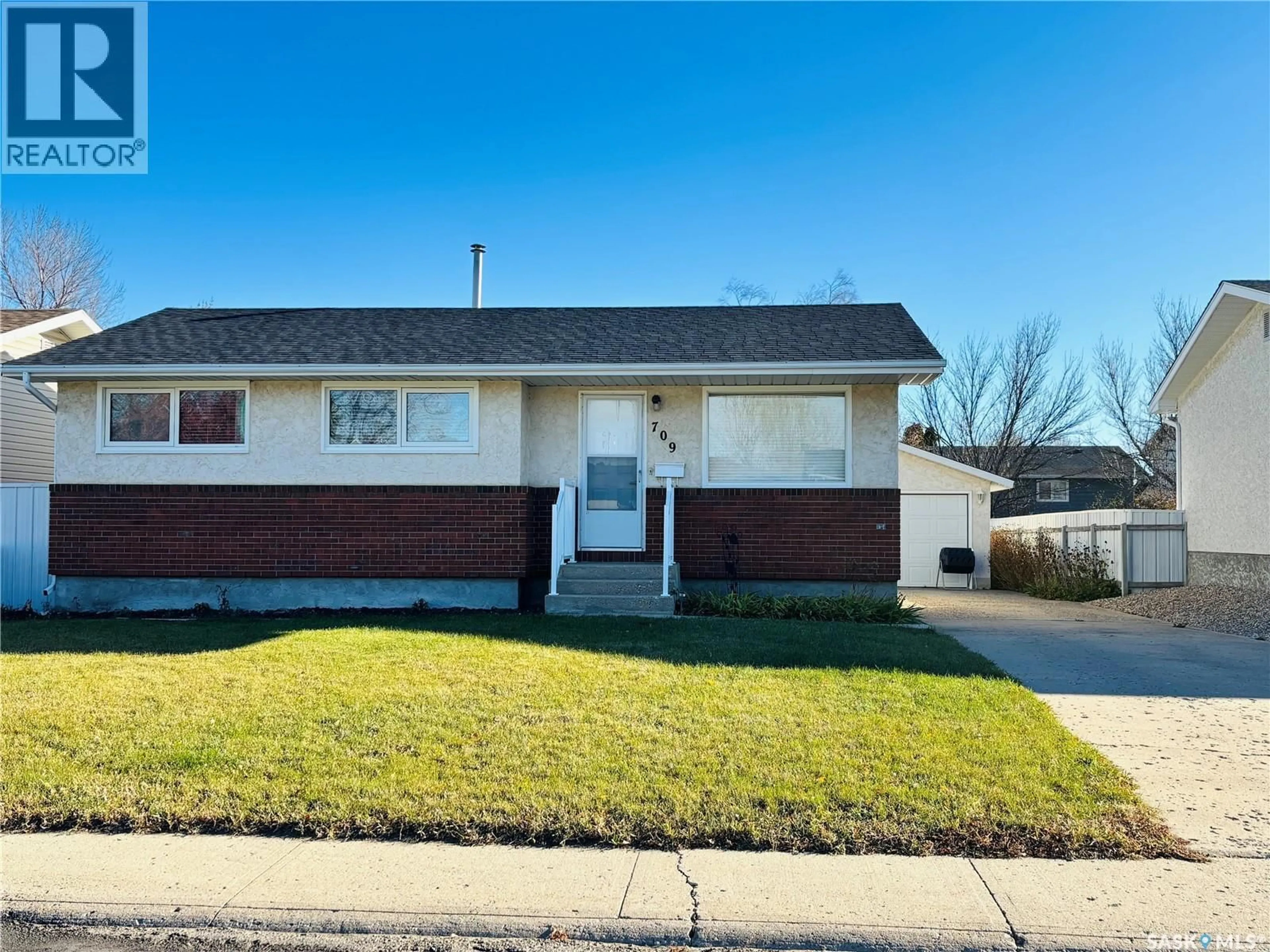 Home with vinyl exterior material, street for 709 ARTHUR AVENUE, Estevan Saskatchewan S4A1K5
