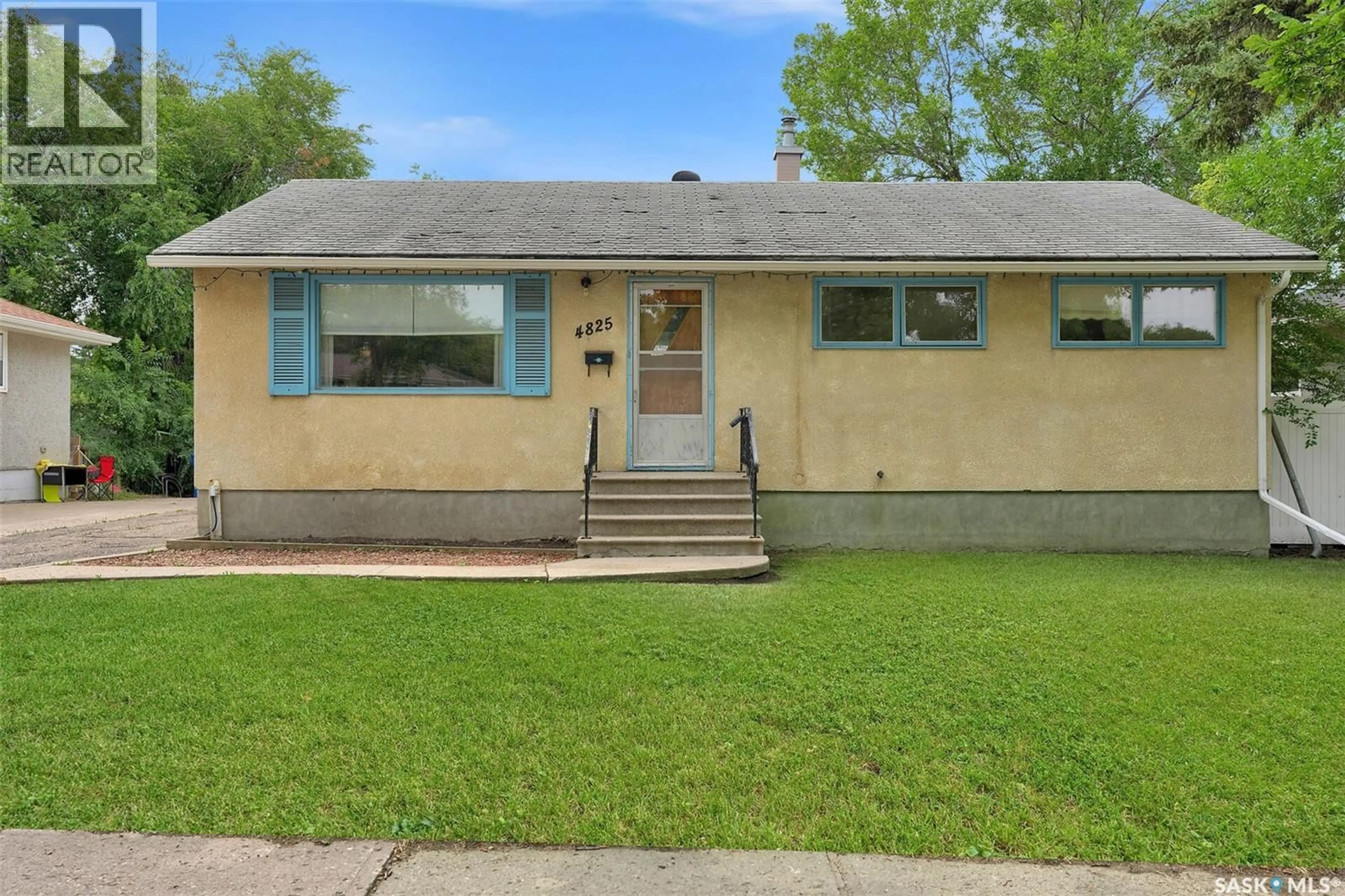 Home with vinyl exterior material, street for 4825 SHERWOOD DRIVE, Regina Saskatchewan S4R4B9