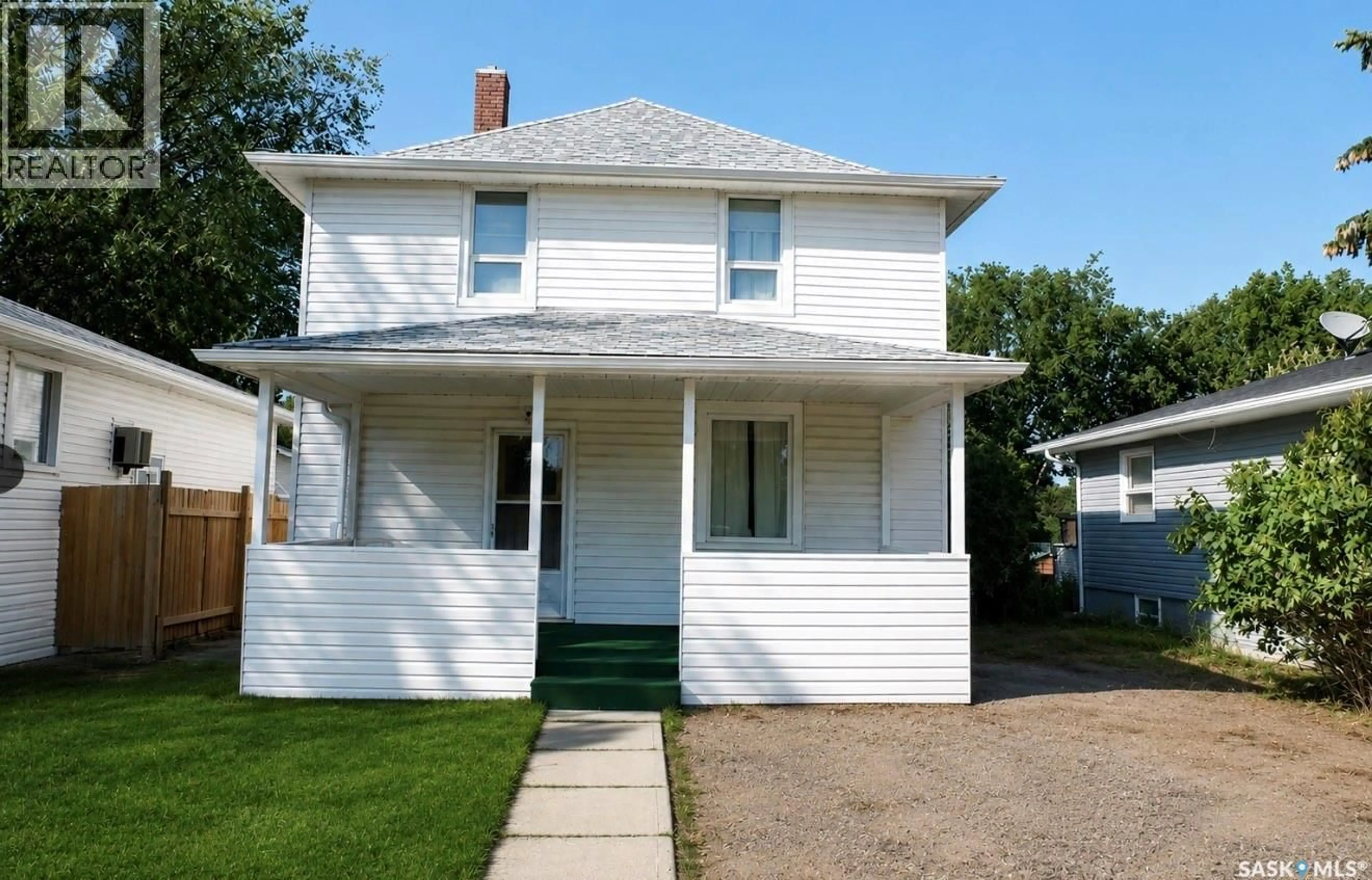 Home with vinyl exterior material, street for 311 7TH AVENUE, Assiniboia Saskatchewan S0H0B0