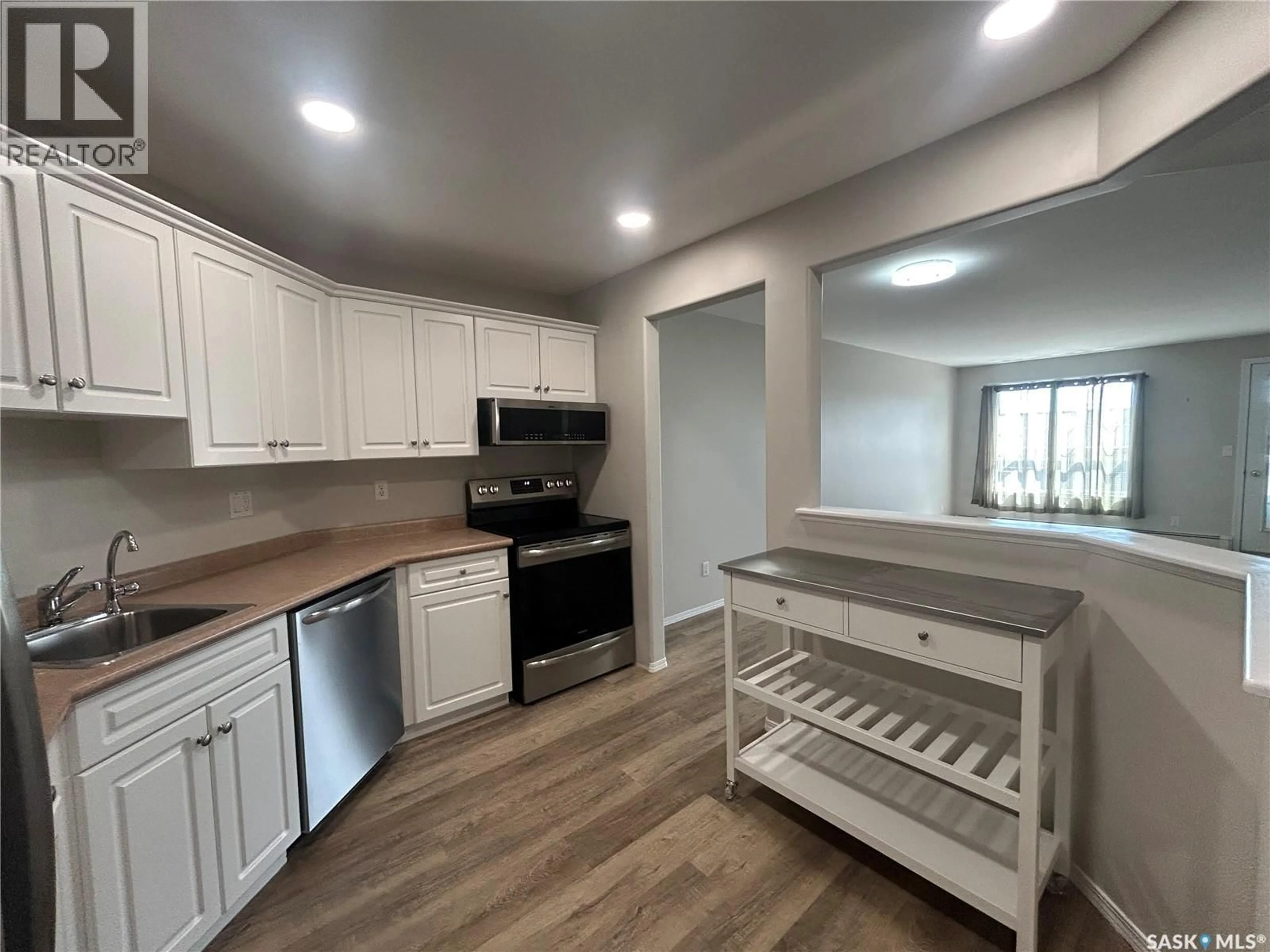 Open concept kitchen, unknown for 206 - 1112 98TH STREET, Tisdale Saskatchewan S0E1T0